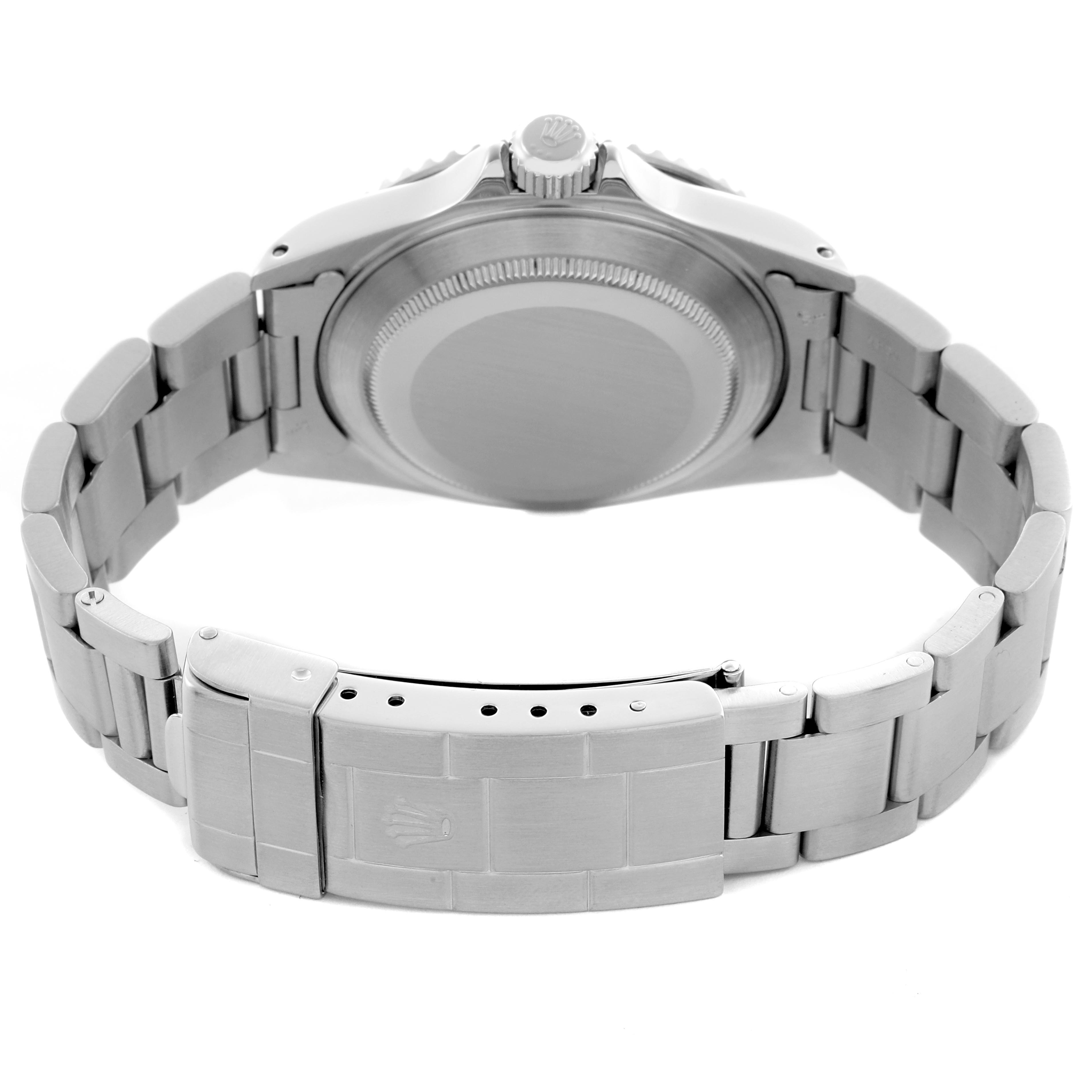 The image shows the back angle of a Rolex Submariner 14060 Men
s Stainless Steel Black Dial 14060 Men
s Stainless Steel Black Dial, highlighting the case back, bracelet, and clasp.