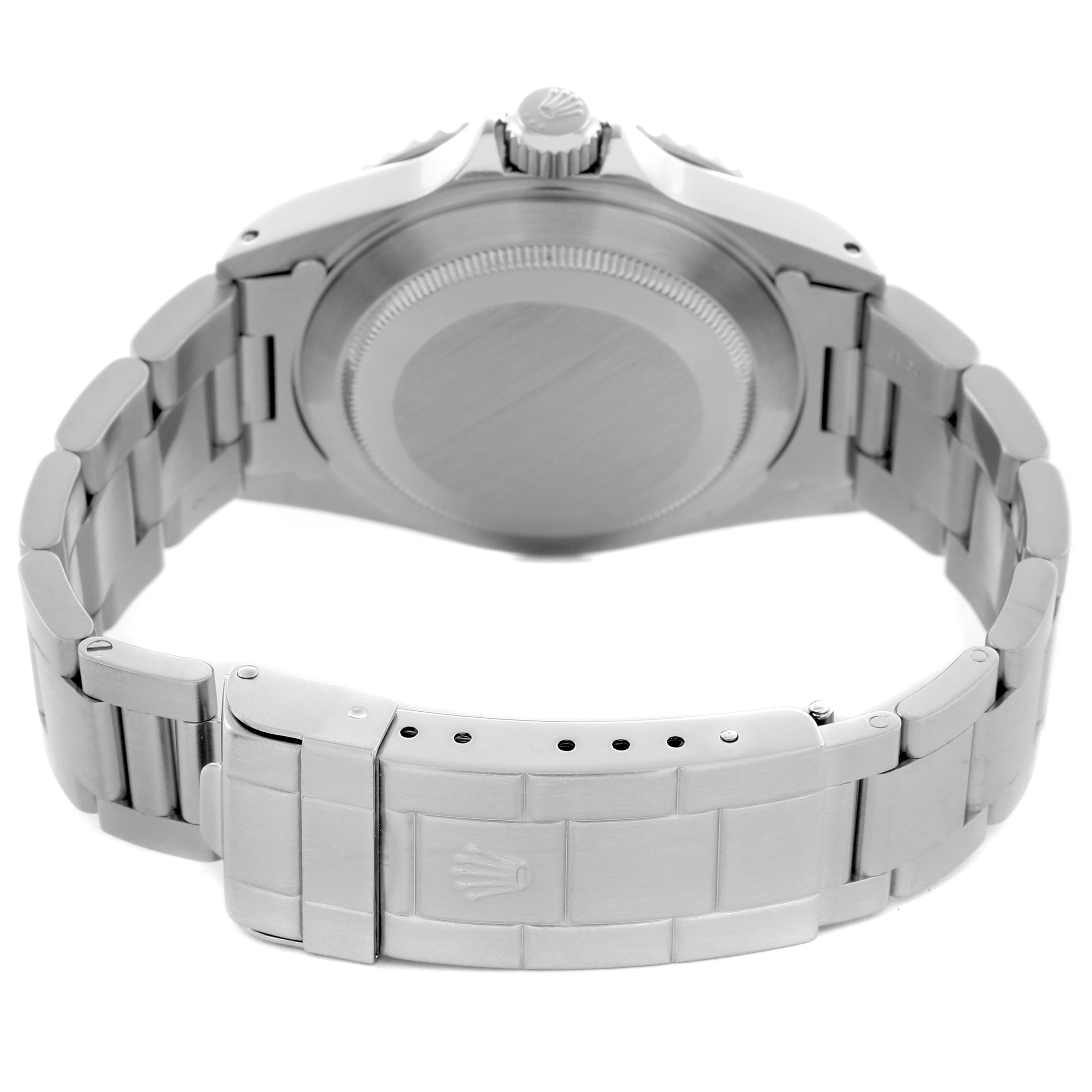 The image shows the back case and bracelet clasp of a Rolex Submariner 14060M Men
s Stainless Steel Black Dial 14060M Men
s Stainless Steel Black Dial watch from a rear angle.