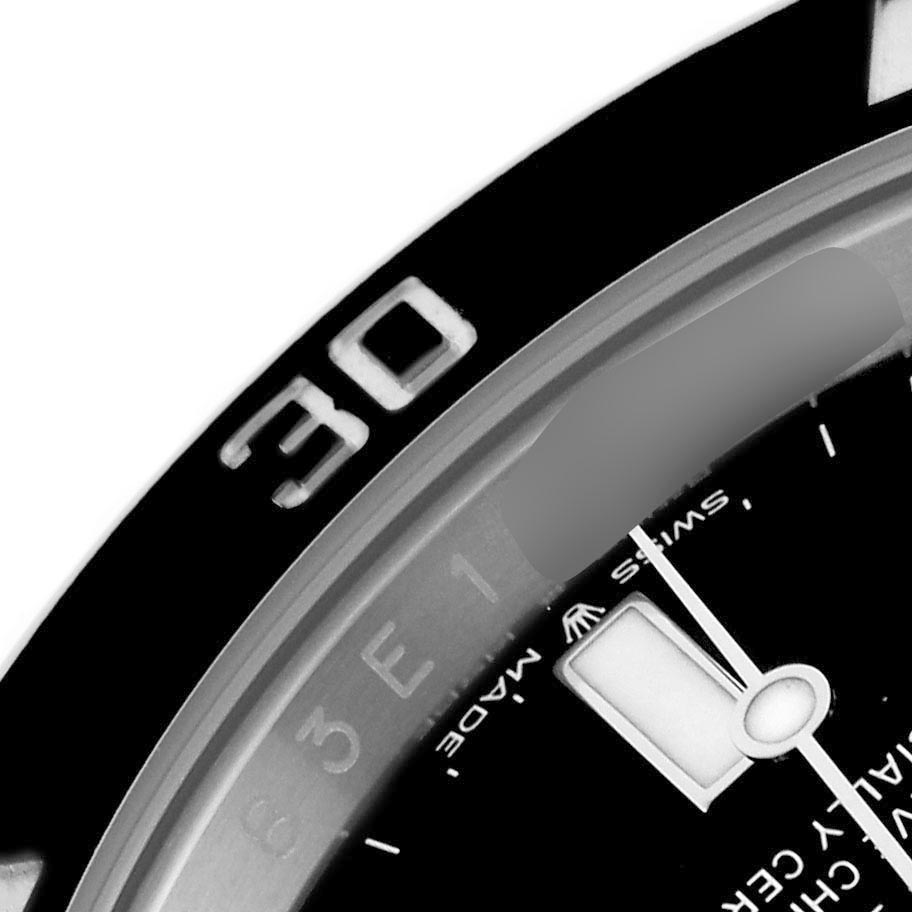 The image shows a close-up of the bezel and dial of a Rolex Submariner 124060 Men
s Stainless Steel Black Dial 124060 Men
s Stainless Steel Black Dial, focusing on the "30" marker.