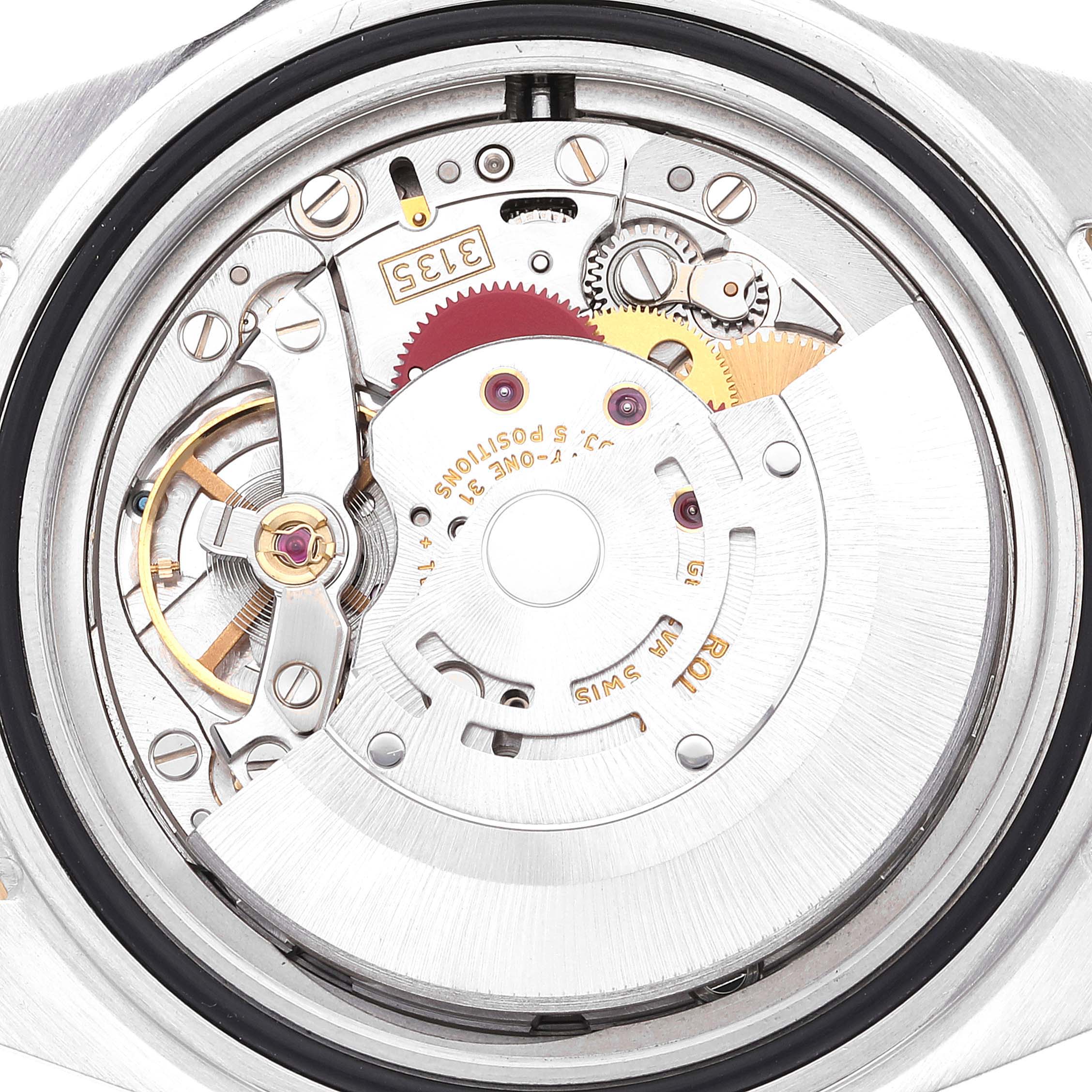 This close-up image shows the intricate inner mechanism and movement of the Rolex Submariner 16613 Men's Steel and Gold (two tone) Black Dial 16613 Men's Steel and Gold (two tone) Black Dial watch.