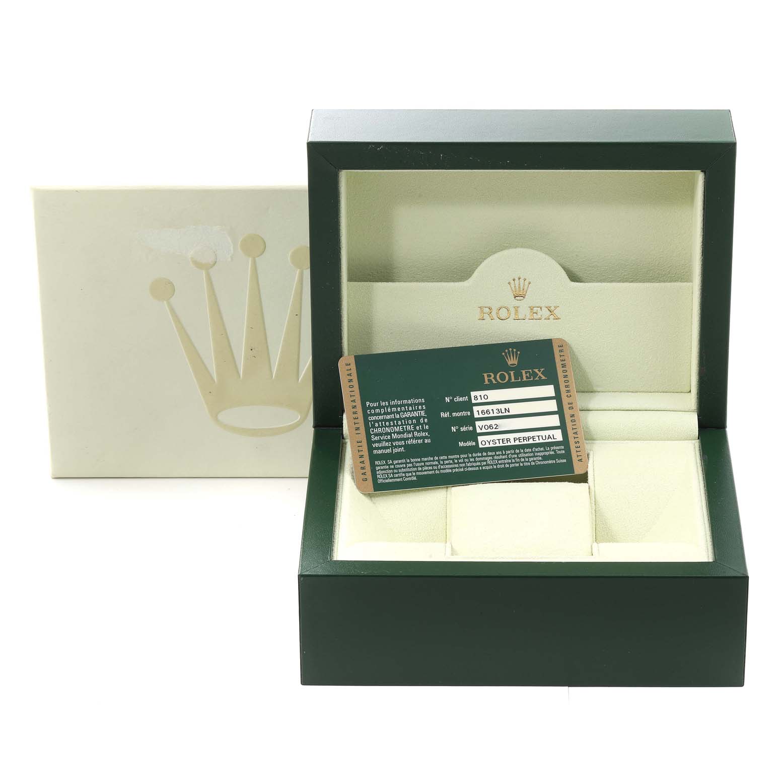 This image shows the open box and warranty card for a Rolex Submariner 16613 Men's Steel and Gold (two tone) Black Dial 16613 Men's Steel and Gold (two tone) Black Dial watch.