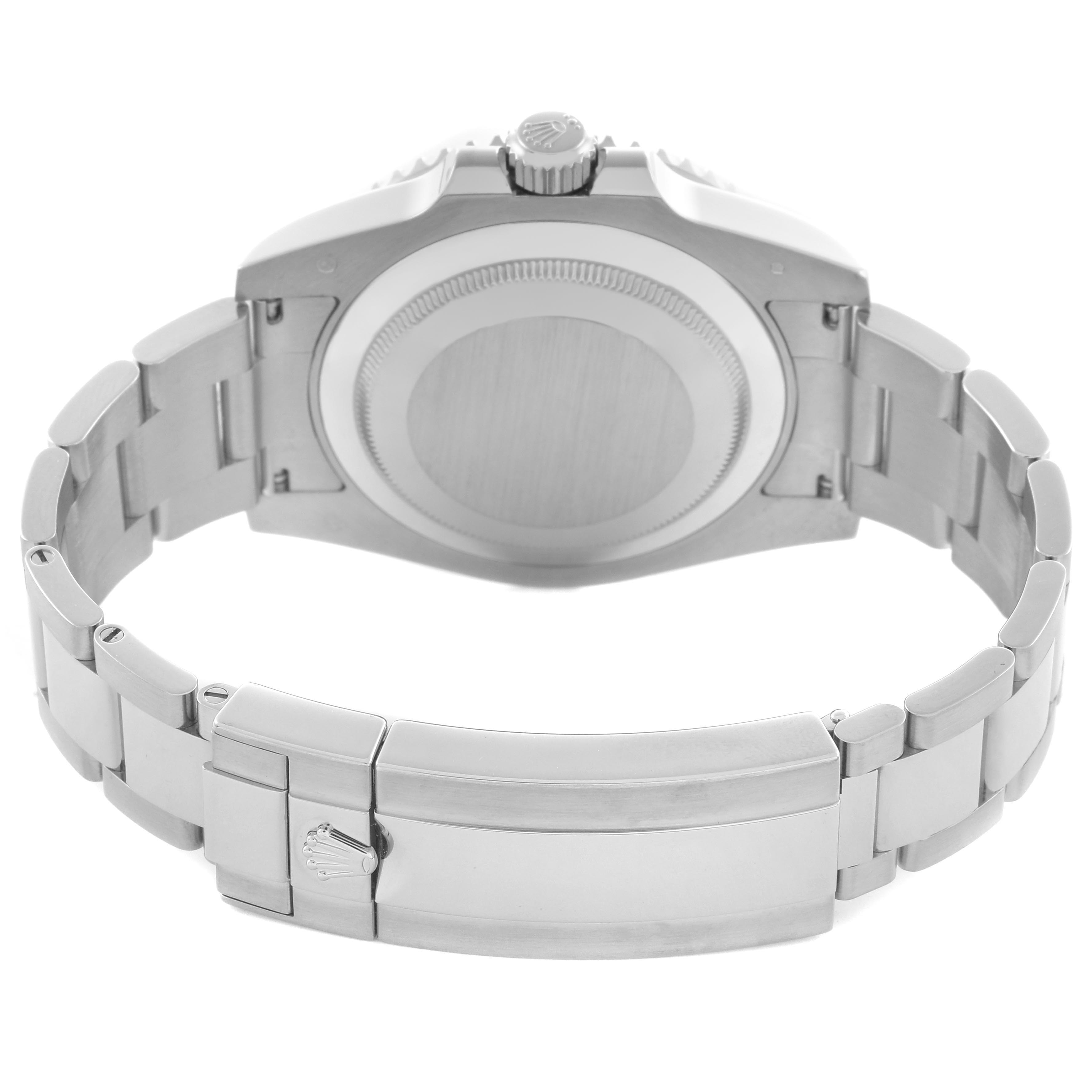 The image shows the back of a Rolex Submariner 116619 Men
s White Gold Blue Dial 116619 Men
s White Gold Blue Dial watch, highlighting the clasp and bracelet with a view of the crown.