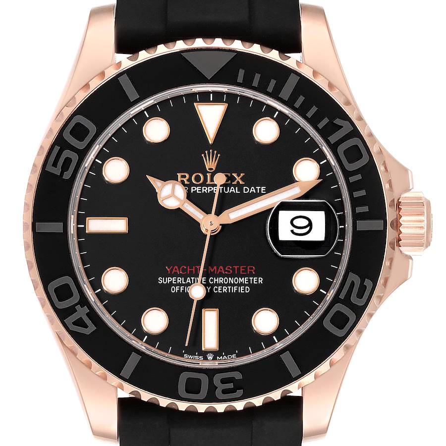 The Rolex Yacht-Master watch is shown from a front angle, featuring the dial, bezel, and date window at 3 o'clock.