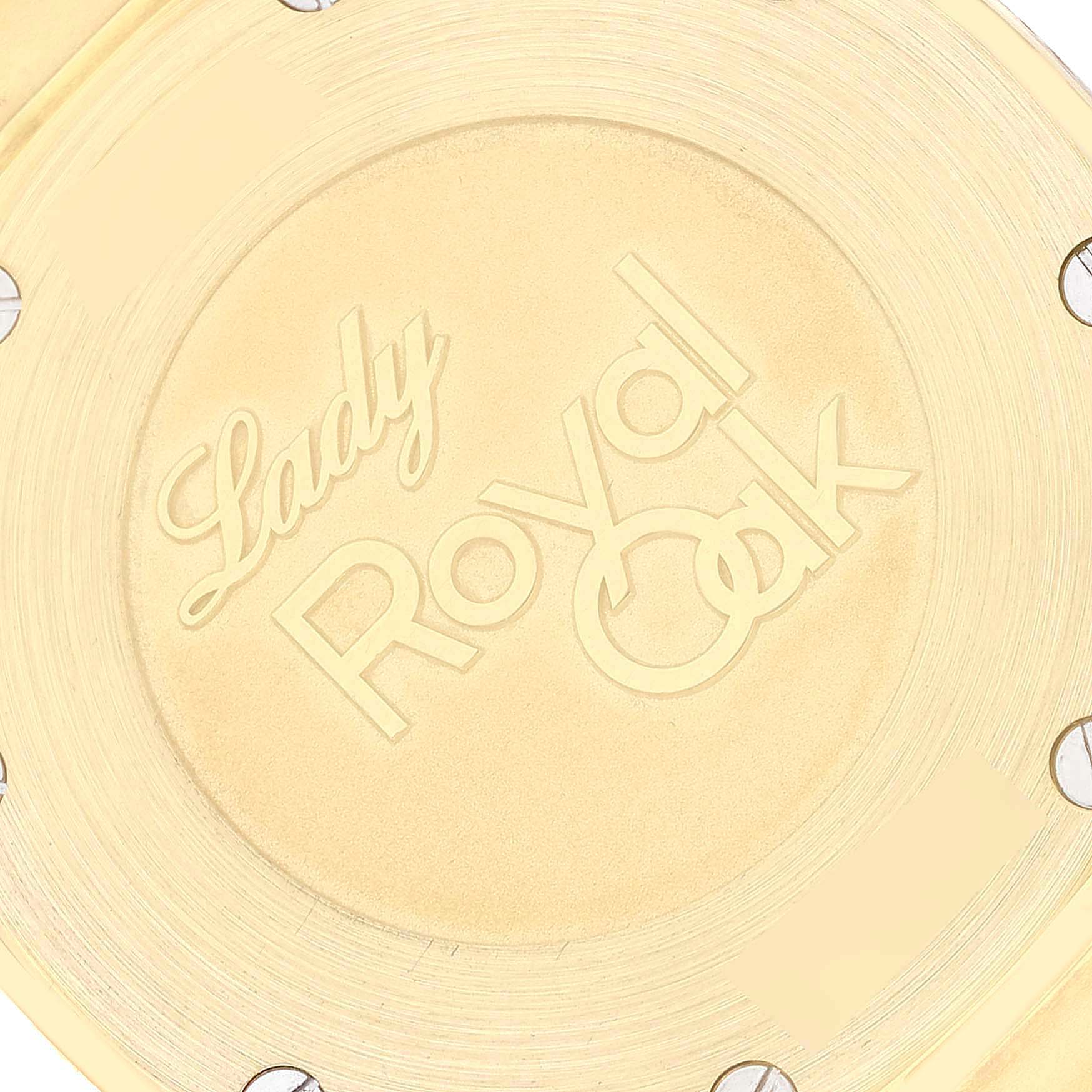 The image shows a close-up view of the engraved case back of a Lady Royal Oak watch by Audemars Piguet.