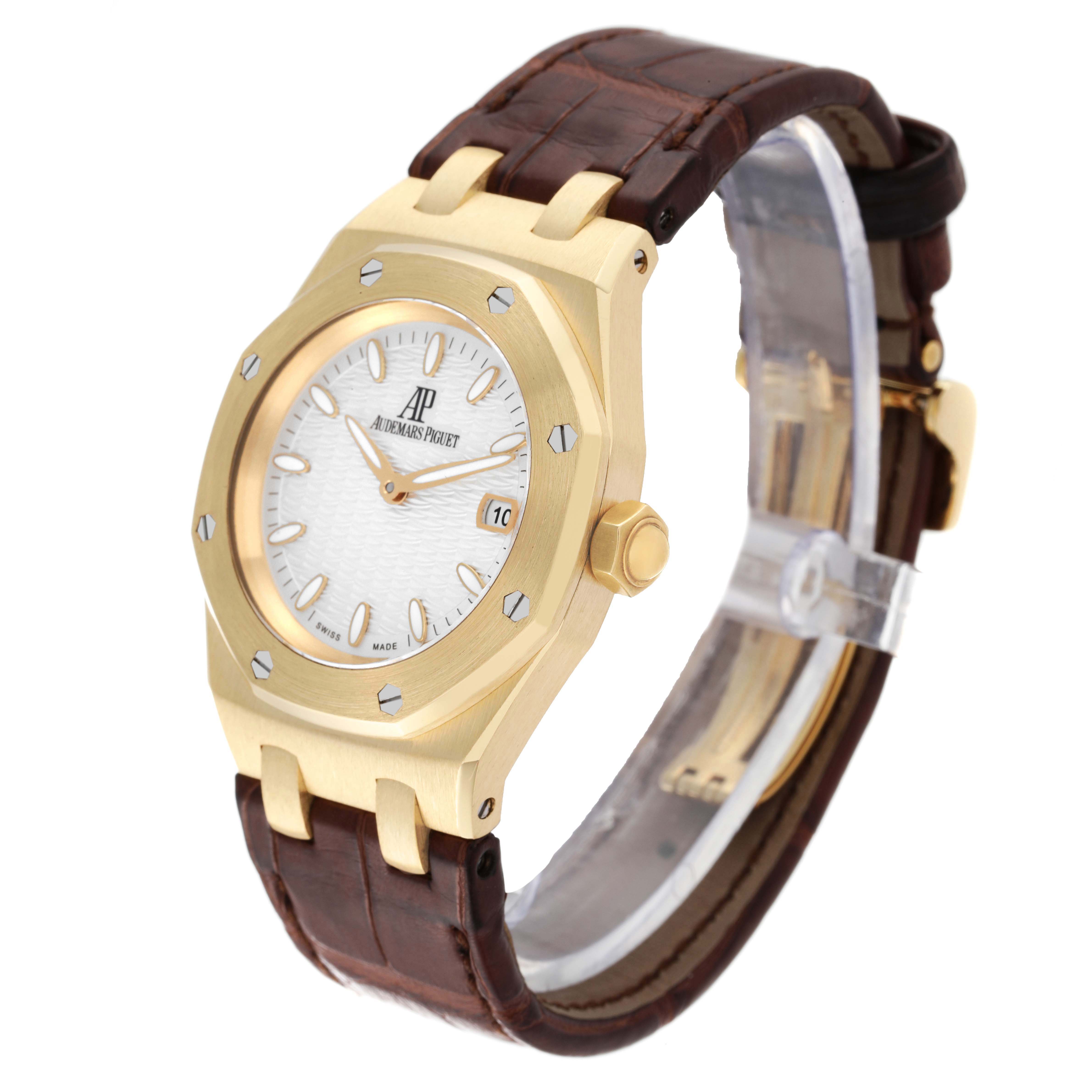 The image shows a Royal Oak watch by Audemars Piguet at a slight angle, displaying the face, crown, case, and leather strap.