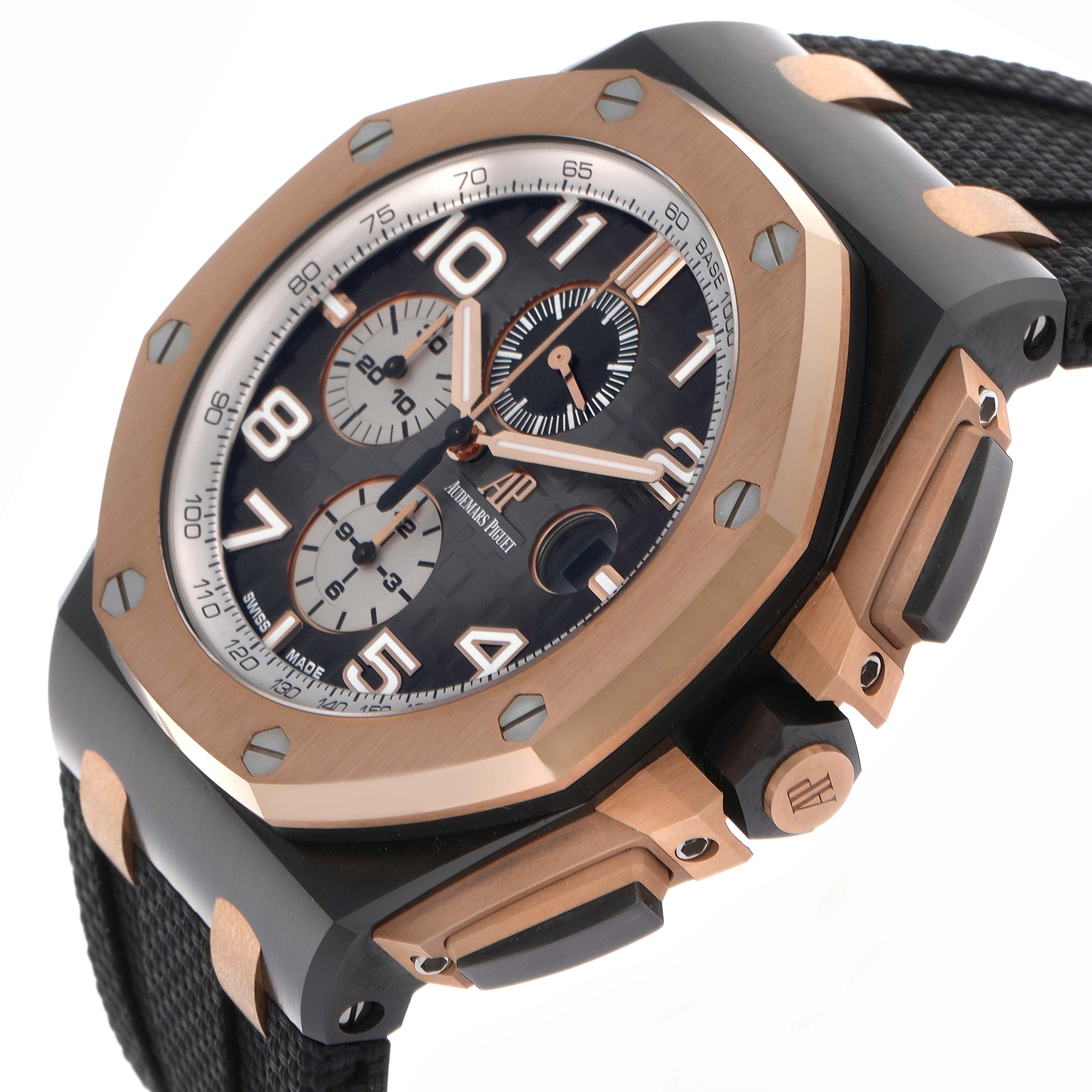 The Audemars Piguet Royal Oak Offshore 26405NR.OO.A002CA.01.A Men
s Ceramic Grey Dial 26405NR.OO.A002CA.01.A Men
s Ceramic Grey Dial is shown at an angled side view, highlighting its bezel, dial, and pushers.