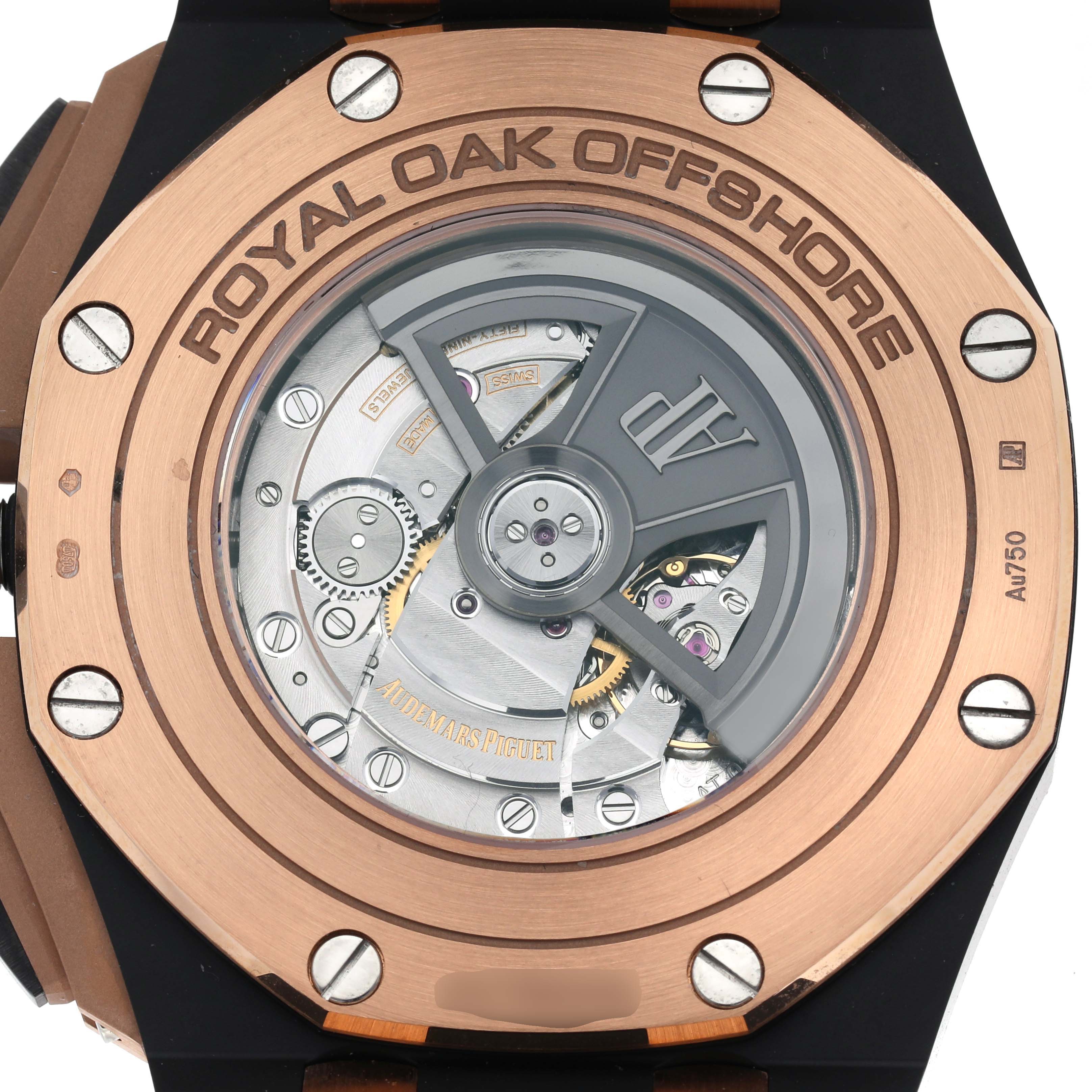 The image shows the case back of the Audemars Piguet Royal Oak Offshore 26405NR.OO.A002CA.01.A Men
s Ceramic Grey Dial 26405NR.OO.A002CA.01.A Men
s Ceramic Grey Dial, highlighting the movement and rotor.