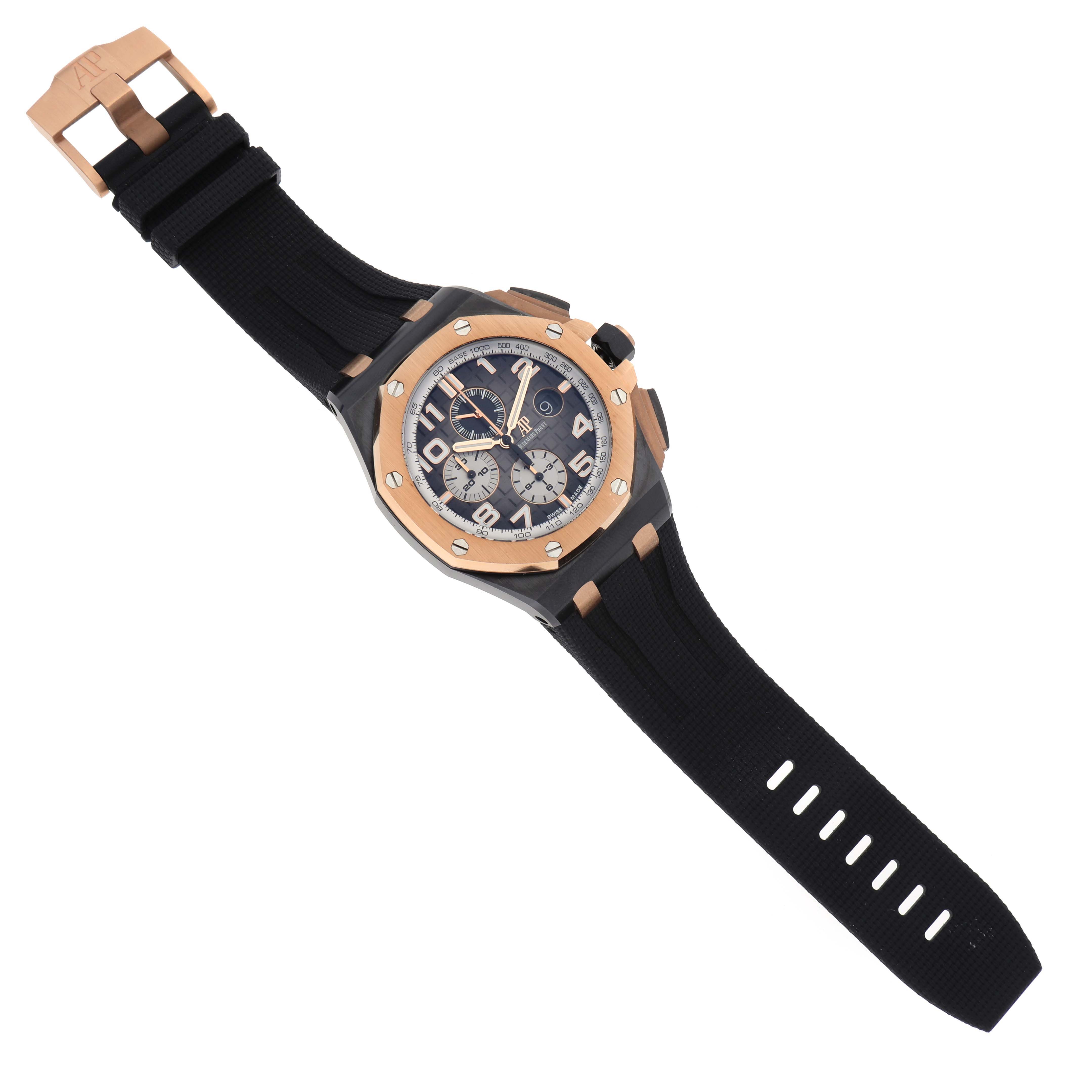 The Audemars Piguet Royal Oak Offshore 26405NR.OO.A002CA.01.A Men
s Ceramic Grey Dial 26405NR.OO.A002CA.01.A Men
s Ceramic Grey Dial watch is shown from a top-down angle, displaying the face, bezel, and strap.