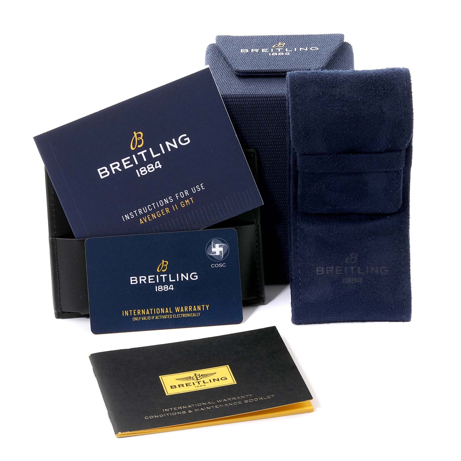 The image shows the packaging and accessories for a Breitling Avenger A32390 Men's Stainless Steel Mother of Pearl Dial A32390 Men's Stainless Steel Mother of Pearl Dial model, including manuals, a warranty card, and a travel case.