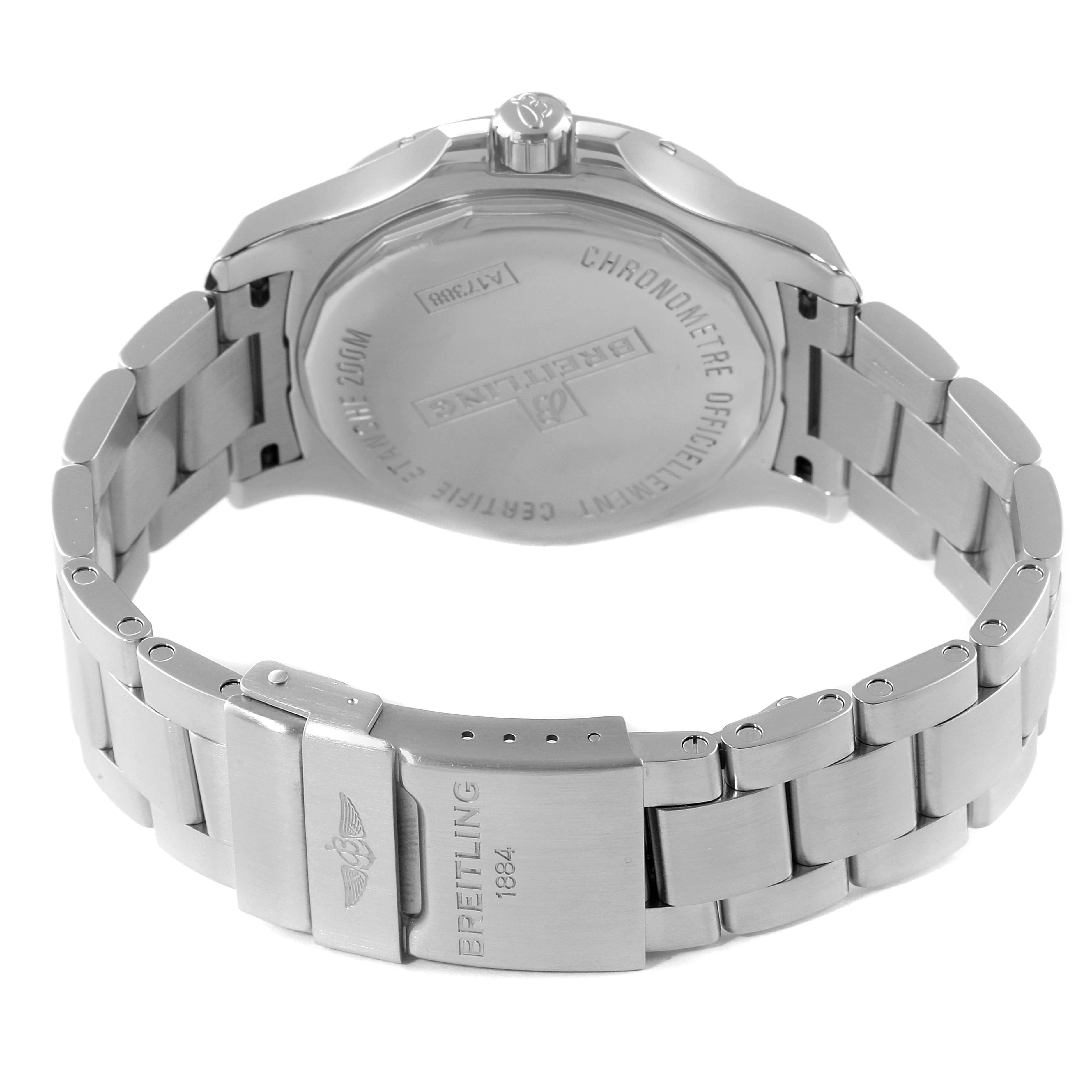 The image shows the back and clasp of a Breitling Colt A17388 Men's Stainless Steel Blue Dial A17388 Men's Stainless Steel Blue Dial watch, highlighting its stainless steel bracelet and engraved case back.