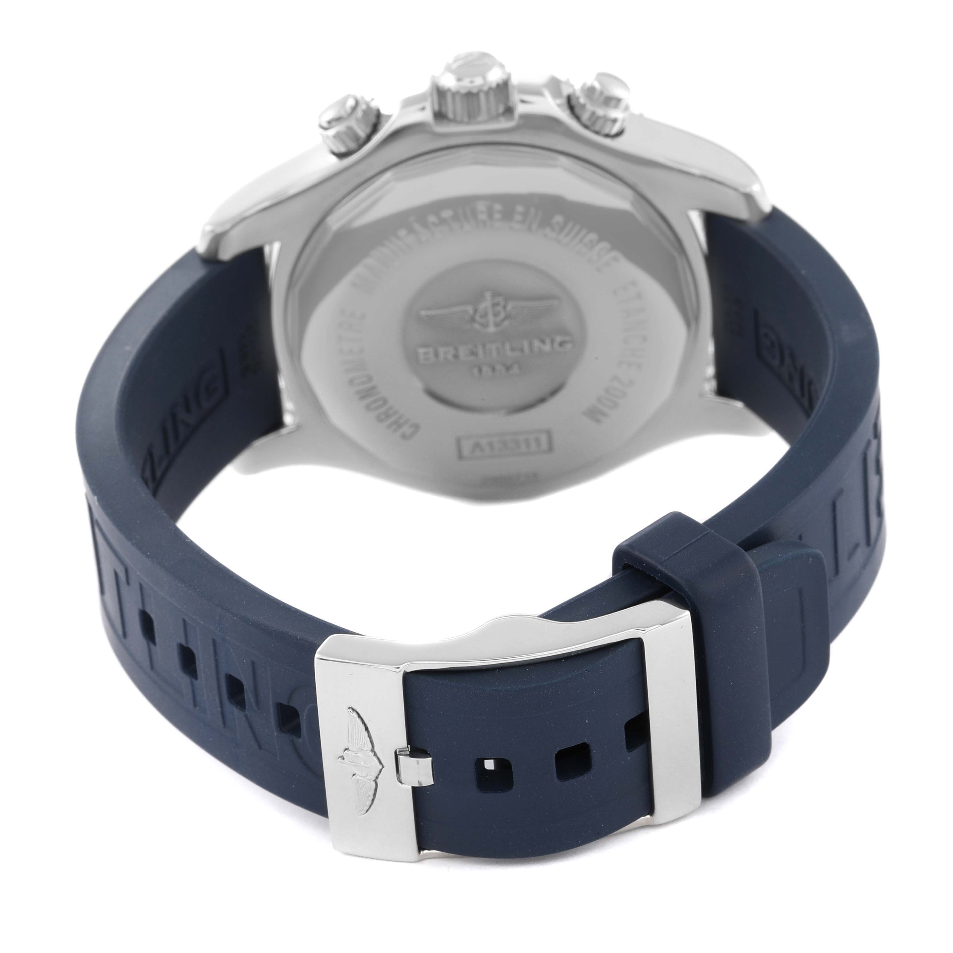 The image shows the back view of a Breitling Superocean A13311 Men's Stainless Steel Blue Dial A13311 Men's Stainless Steel Blue Dial watch, highlighting the case back and a blue rubber strap with a metal buckle.