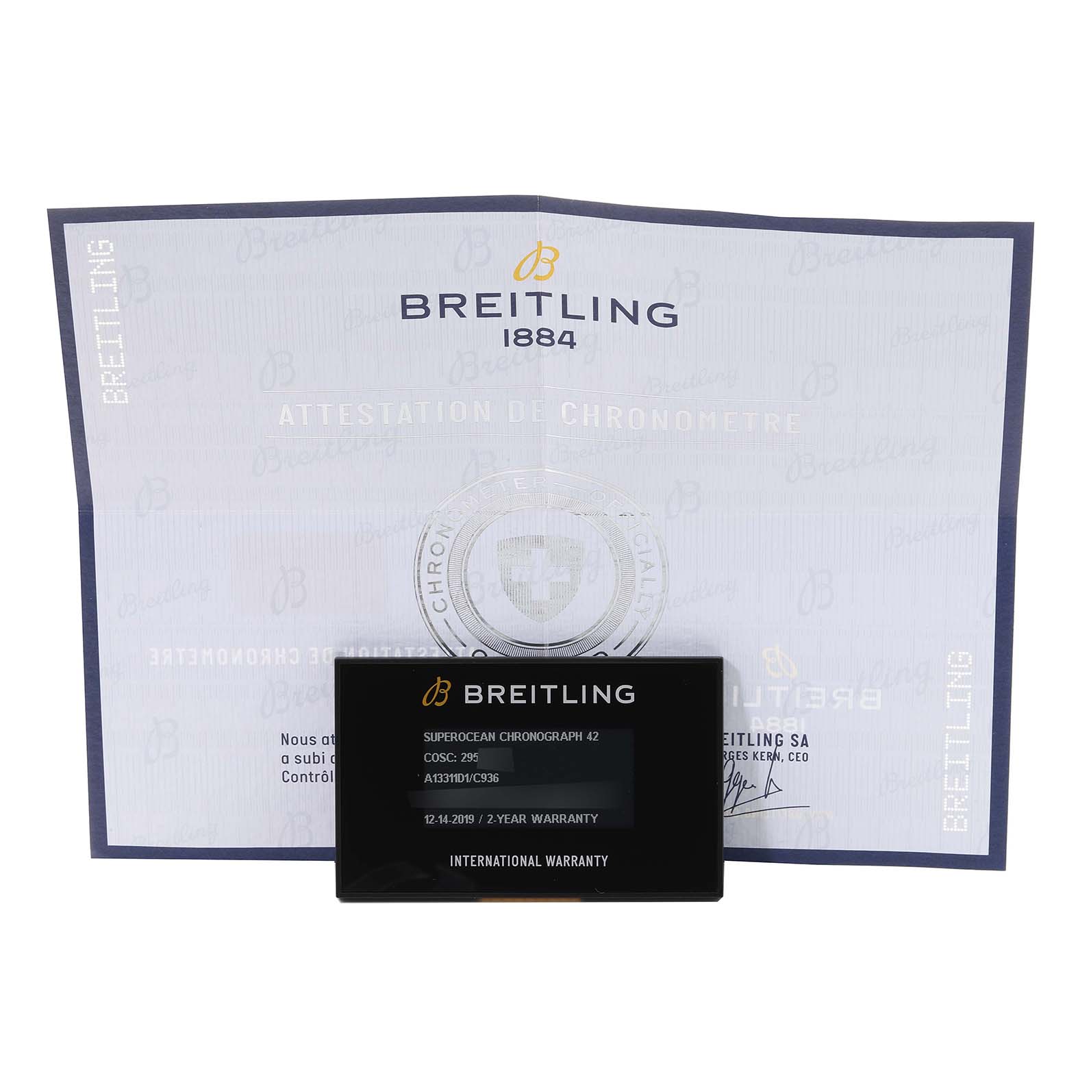 The image shows the warranty card and chronometer certificate for the Breitling Superocean A13311 Men's Stainless Steel Blue Dial A13311 Men's Stainless Steel Blue Dial model.