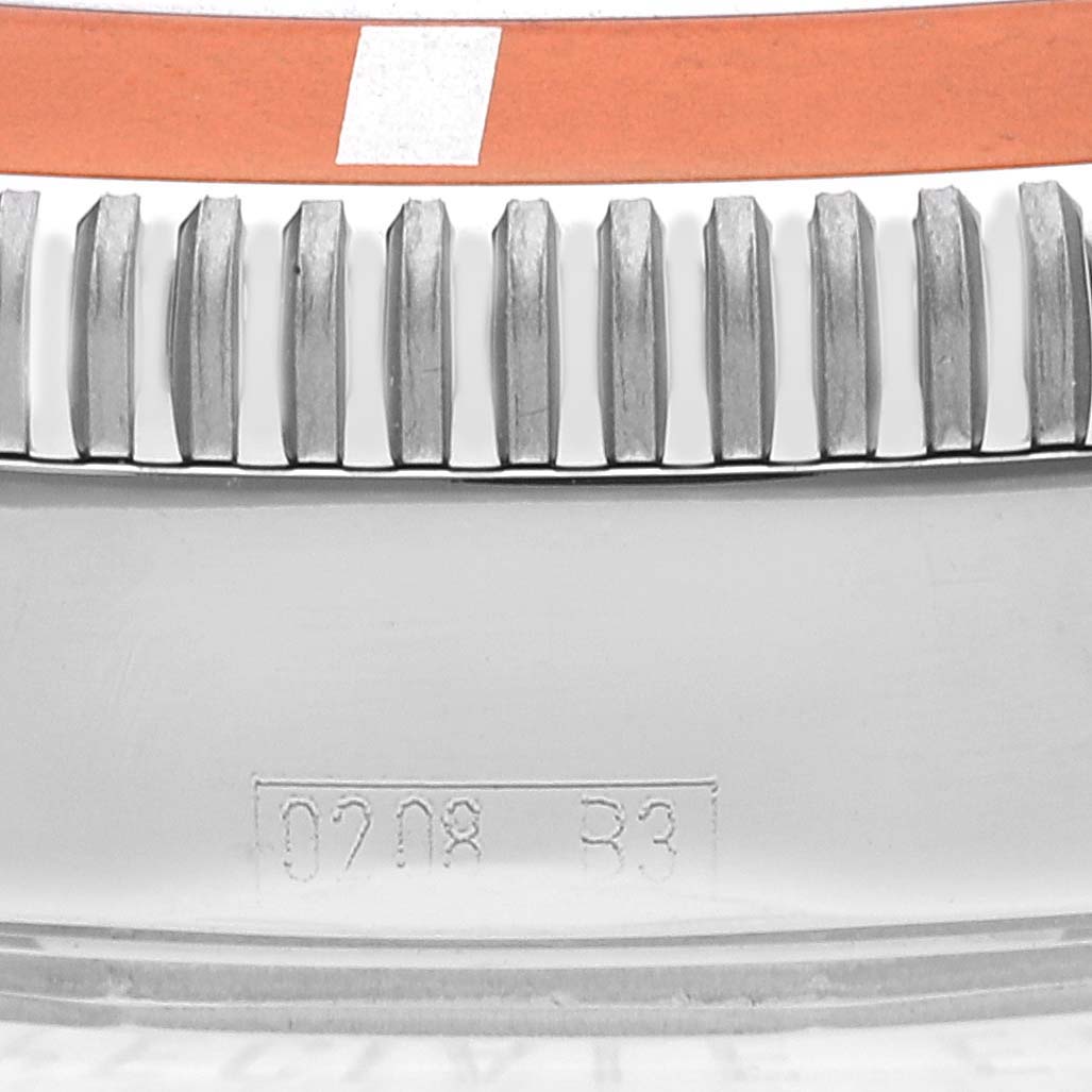 This is a close-up of the bezel and part of the casing of the Breitling Superocean A17320 Men's Stainless Steel Brown Dial A17320 Men's Stainless Steel Brown Dial watch.