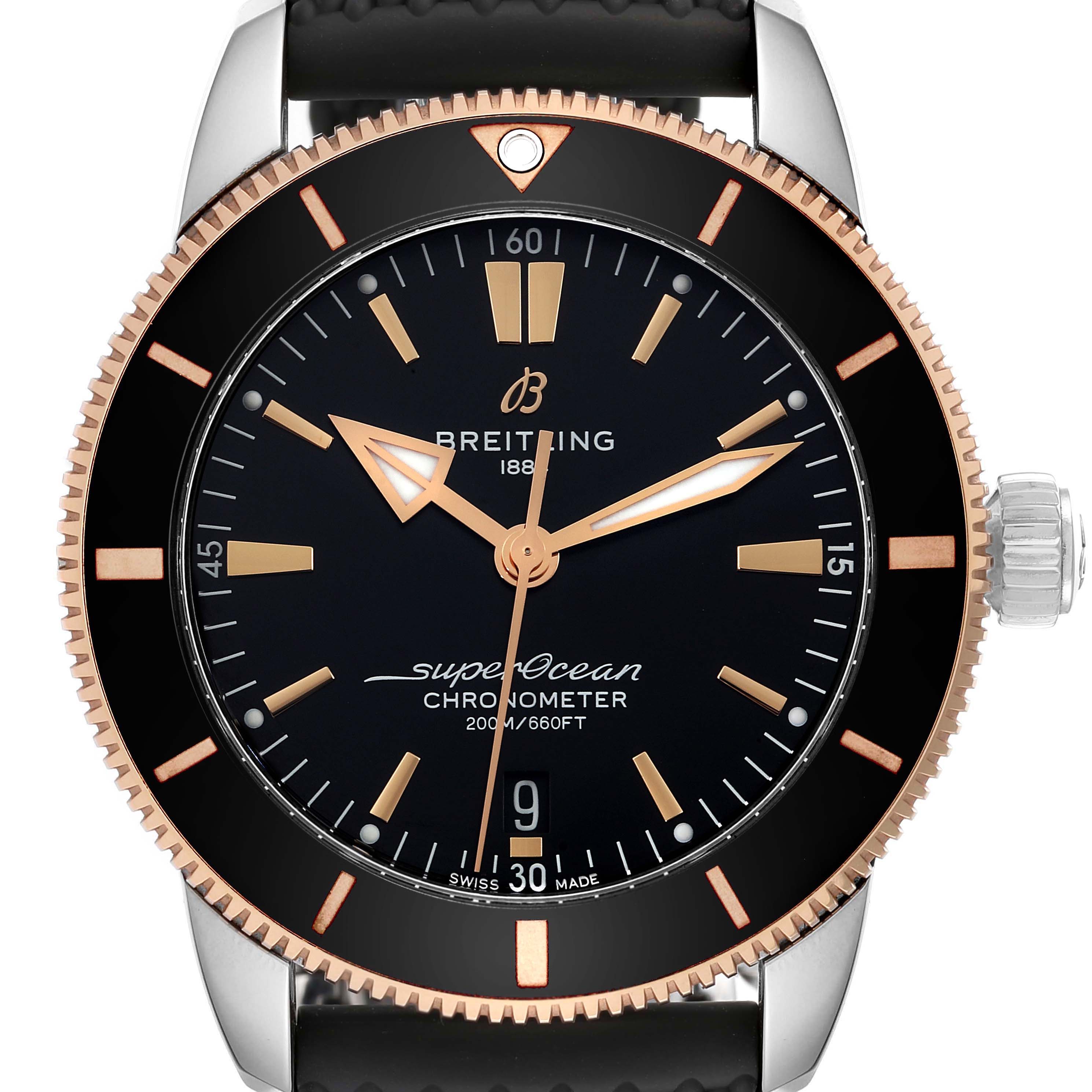This image shows a front view of the Breitling Superocean UB2030121B1A1 Men's Steel and Gold (two tone) Black Dial UB2030121B1A1 Men's Steel and Gold (two tone) Black Dial watch, displaying the dial, hands, bezel, and part of the strap.