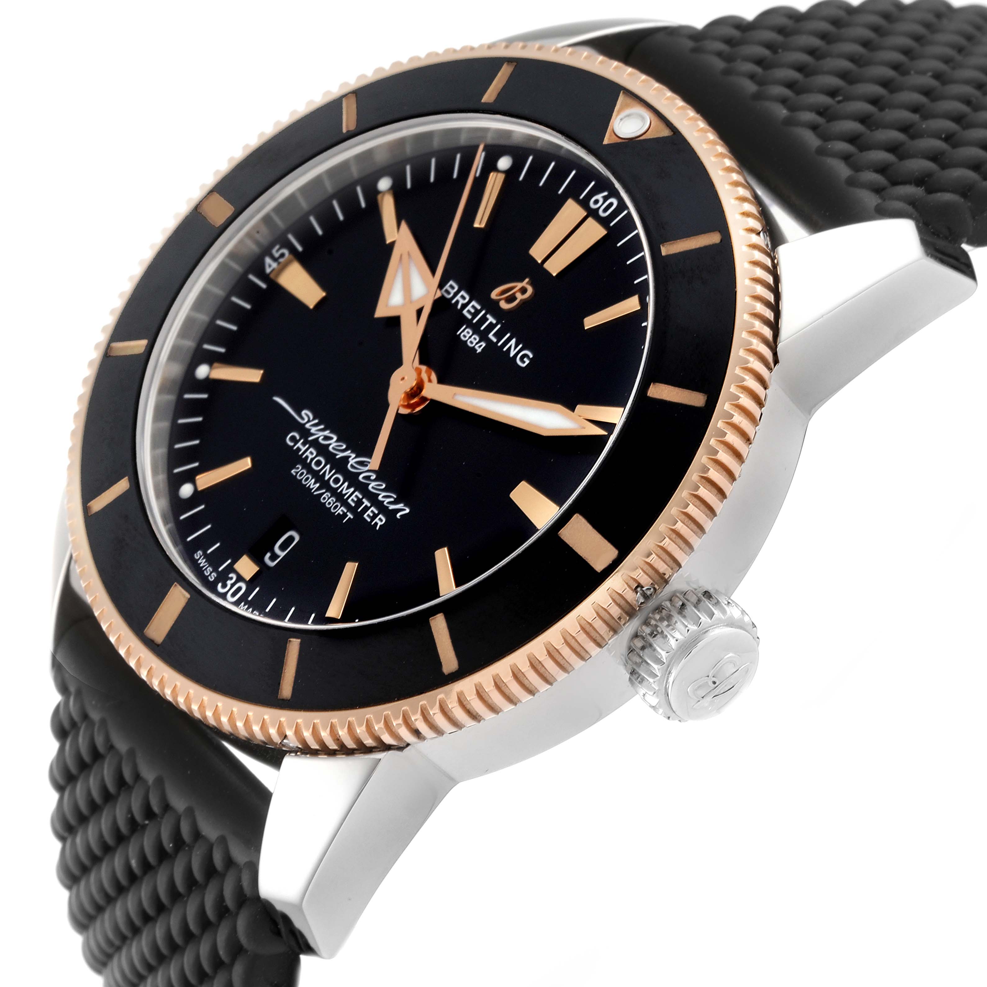 The Breitling Superocean UB2030121B1A1 Men's Steel and Gold (two tone) Black Dial UB2030121B1A1 Men's Steel and Gold (two tone) Black Dial watch is shown from an angled side view, highlighting its bezel, dial, crown, and rubber strap.