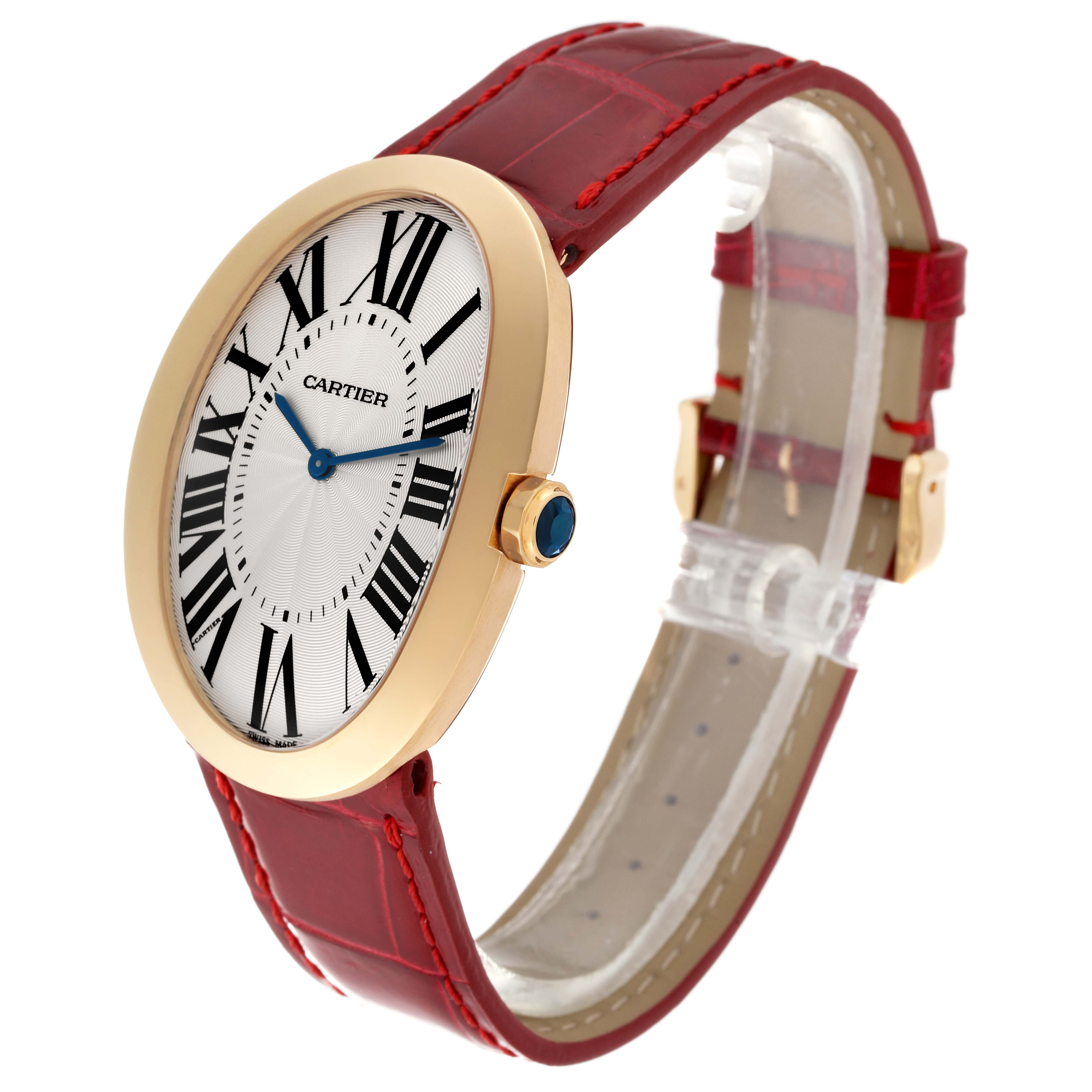 The Cartier Baignoire W8000013 Women's Yellow Gold Silver Dial W8000013 Women's Yellow Gold Silver Dial watch is shown at a slight side angle, displaying its oval dial, red leather strap, and gold bezel.