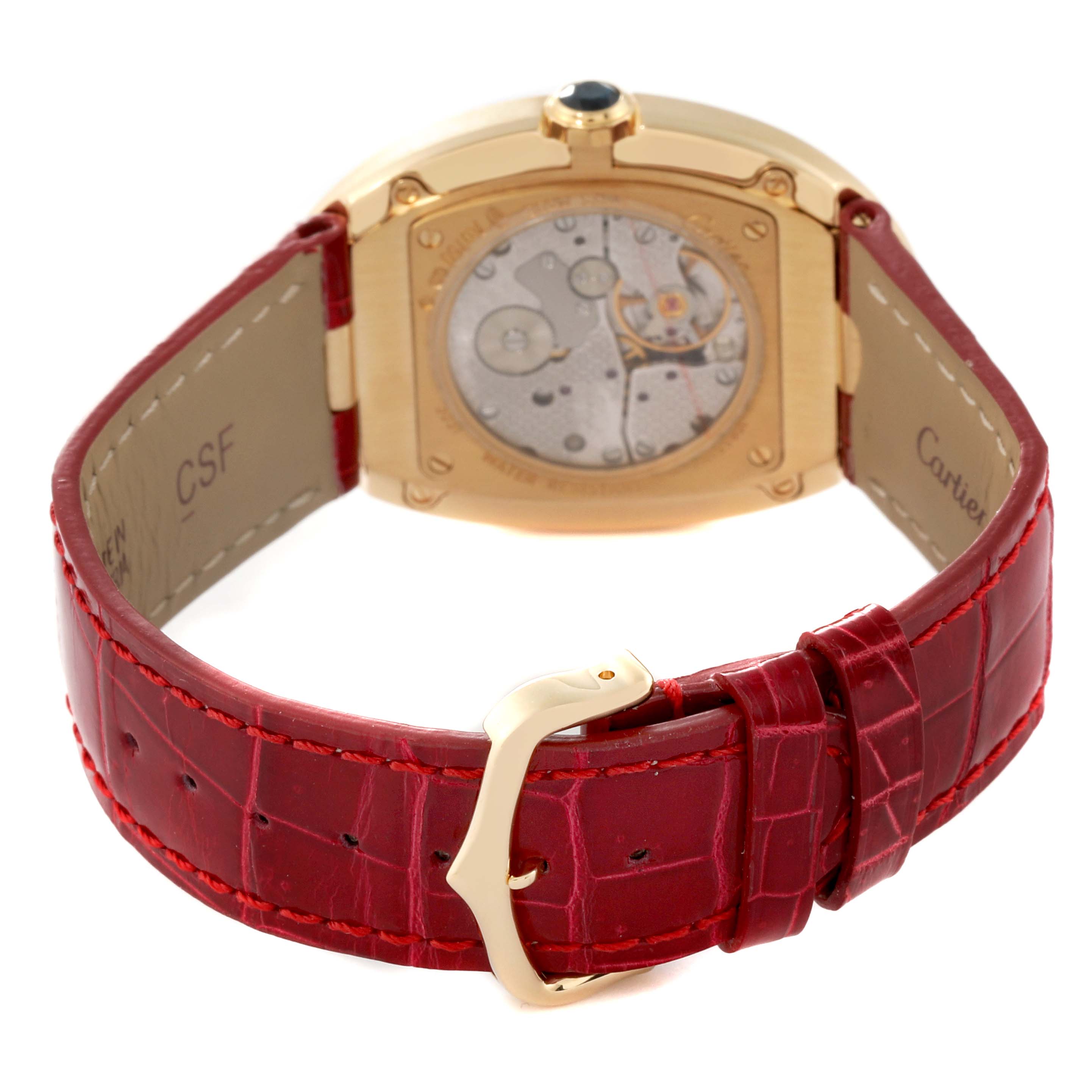 The image shows the back view of the Cartier Baignoire W8000013 Women's Yellow Gold Silver Dial W8000013 Women's Yellow Gold Silver Dial watch, highlighting the movement and a red leather strap.