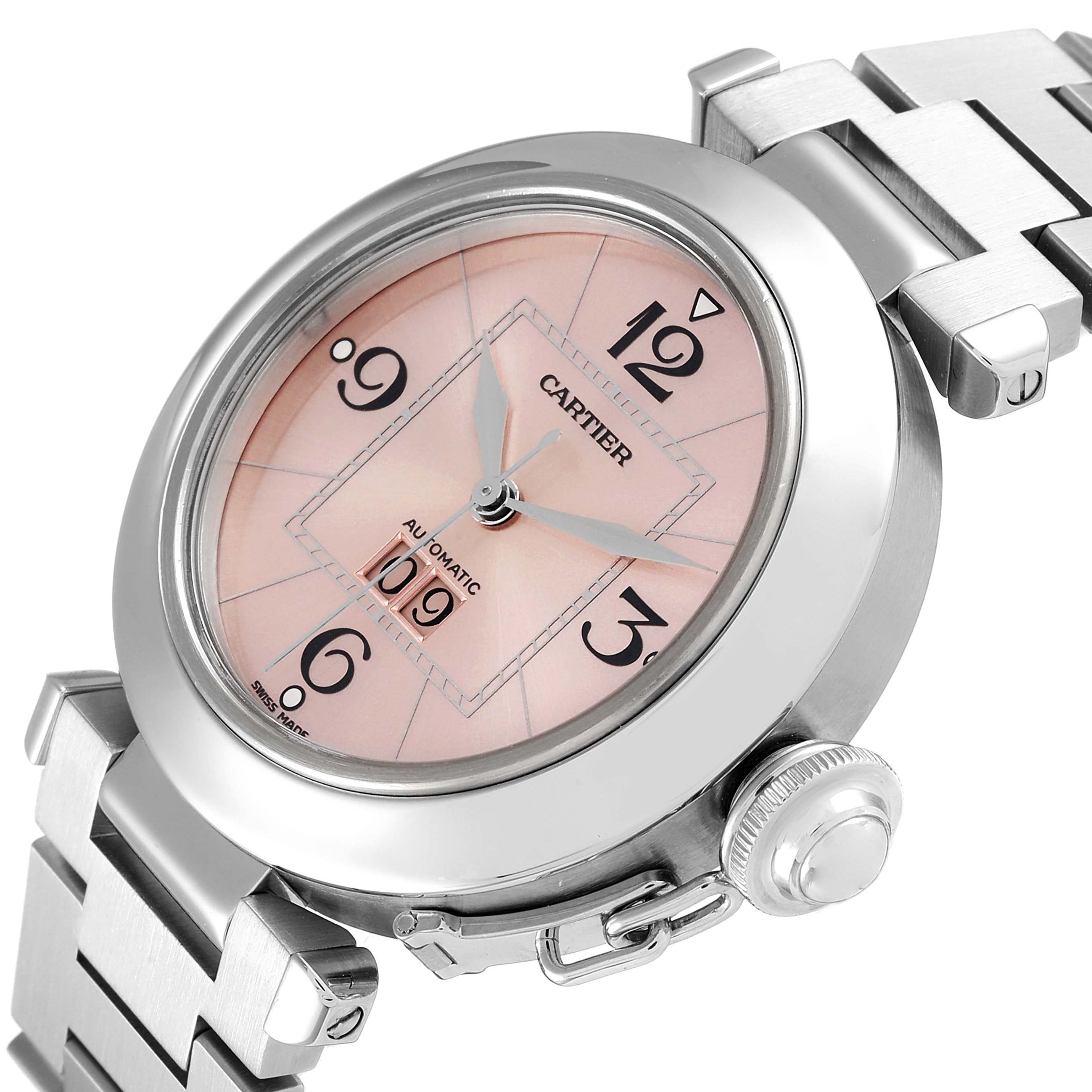 The image shows a Cartier Pasha W31058M7 Women's Stainless Steel Pink Dial W31058M7 Women's Stainless Steel Pink Dial watch at a three-quarter angle, highlighting the face, bezel, crown, and part of the bracelet.