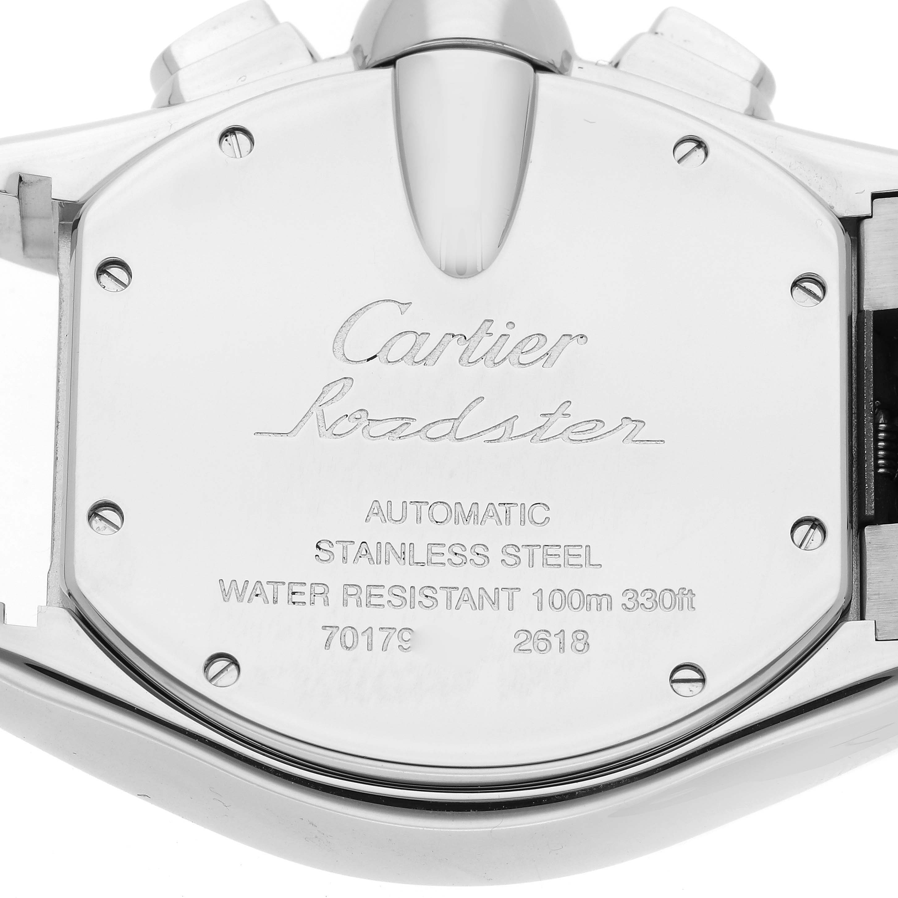 The image shows the stainless steel case back of a Cartier Roadster W62020X6 Men's Stainless Steel Black Dial W62020X6 Men's Stainless Steel Black Dial watch, detailing its water resistance and model information.