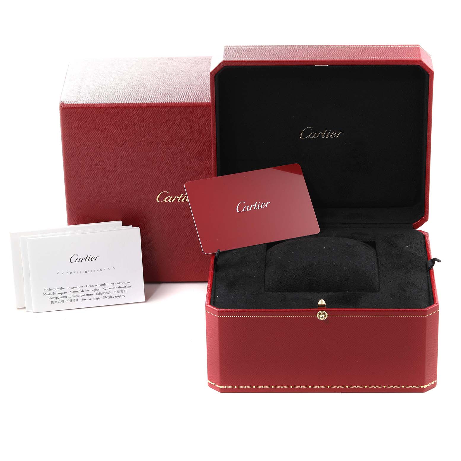 The image shows an open Cartier watch box for the Santos Dumont model, including the cushion, a card, and booklets.