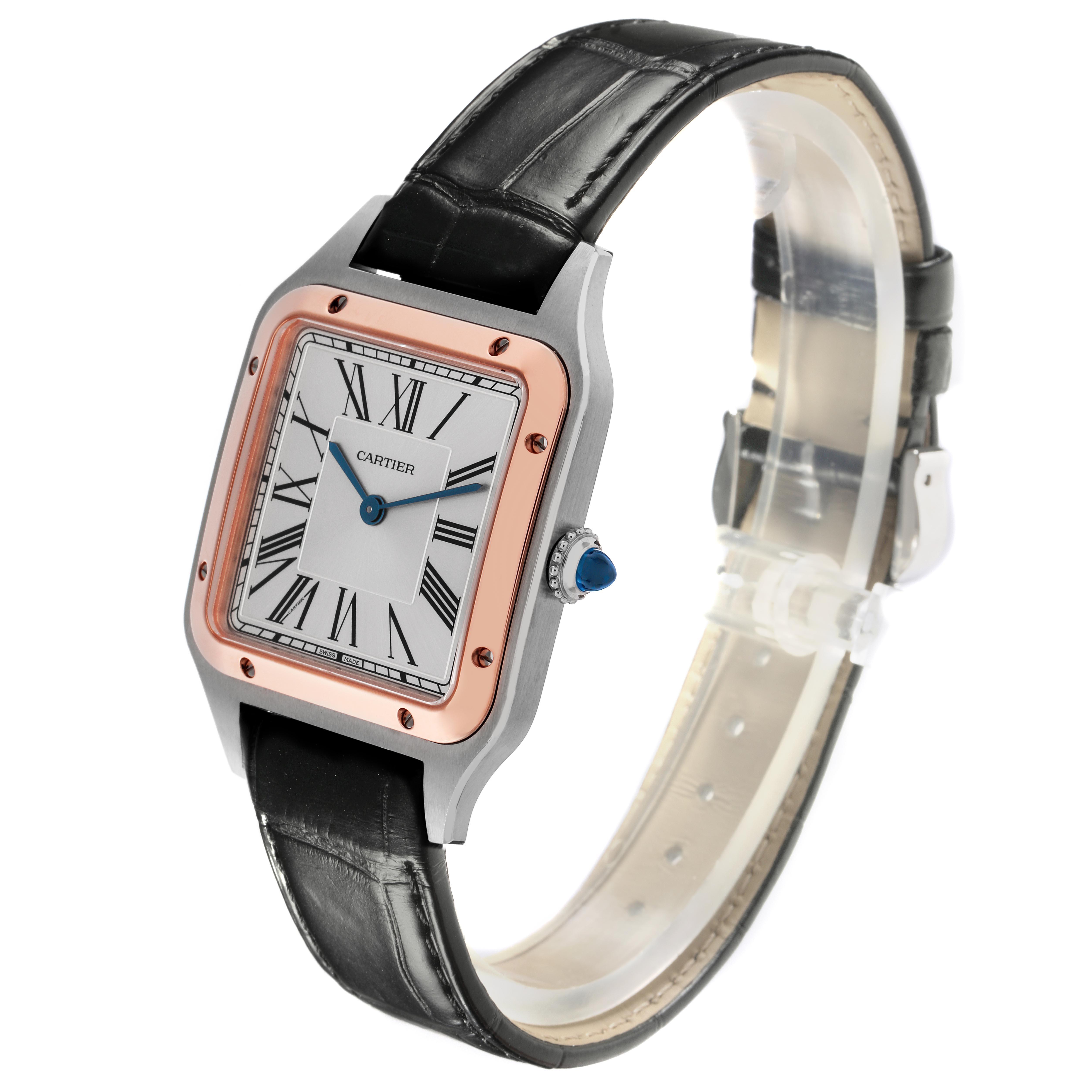 The Cartier Santos Dumont W2SA0011 Men
s Steel and Gold (two tone) Silver Dial W2SA0011 Men
s Steel and Gold (two tone) Silver Dial watch is shown at a side angle, highlighting the square face, crown, and black leather strap.