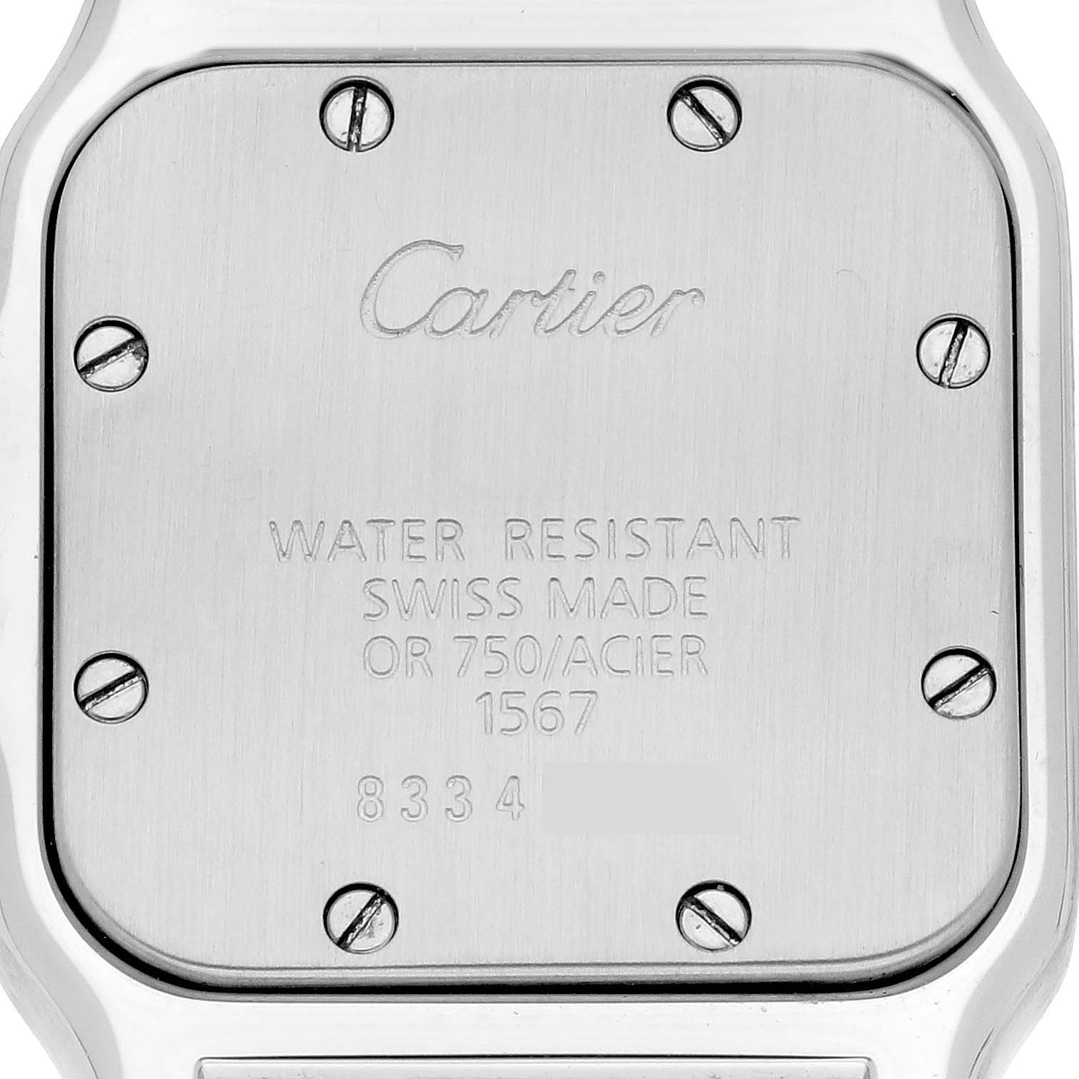 The image shows the back case of a Cartier Santos W20012C4 Women's Steel and Gold (two tone) Silver Dial W20012C4 Women's Steel and Gold (two tone) Silver Dial watch with inscriptions and screws visible.