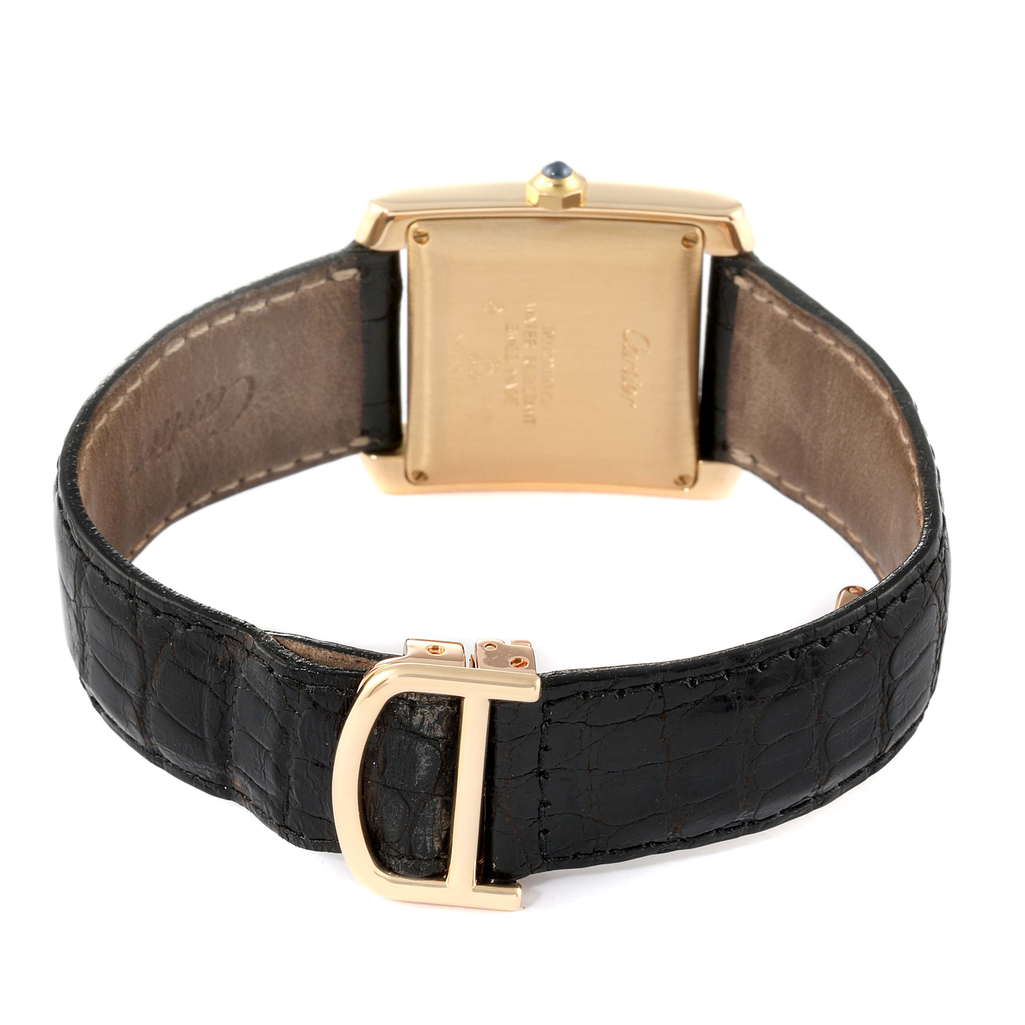 The image shows the backside of the Cartier Tank Française watch, including the case back, leather strap, and buckle.
