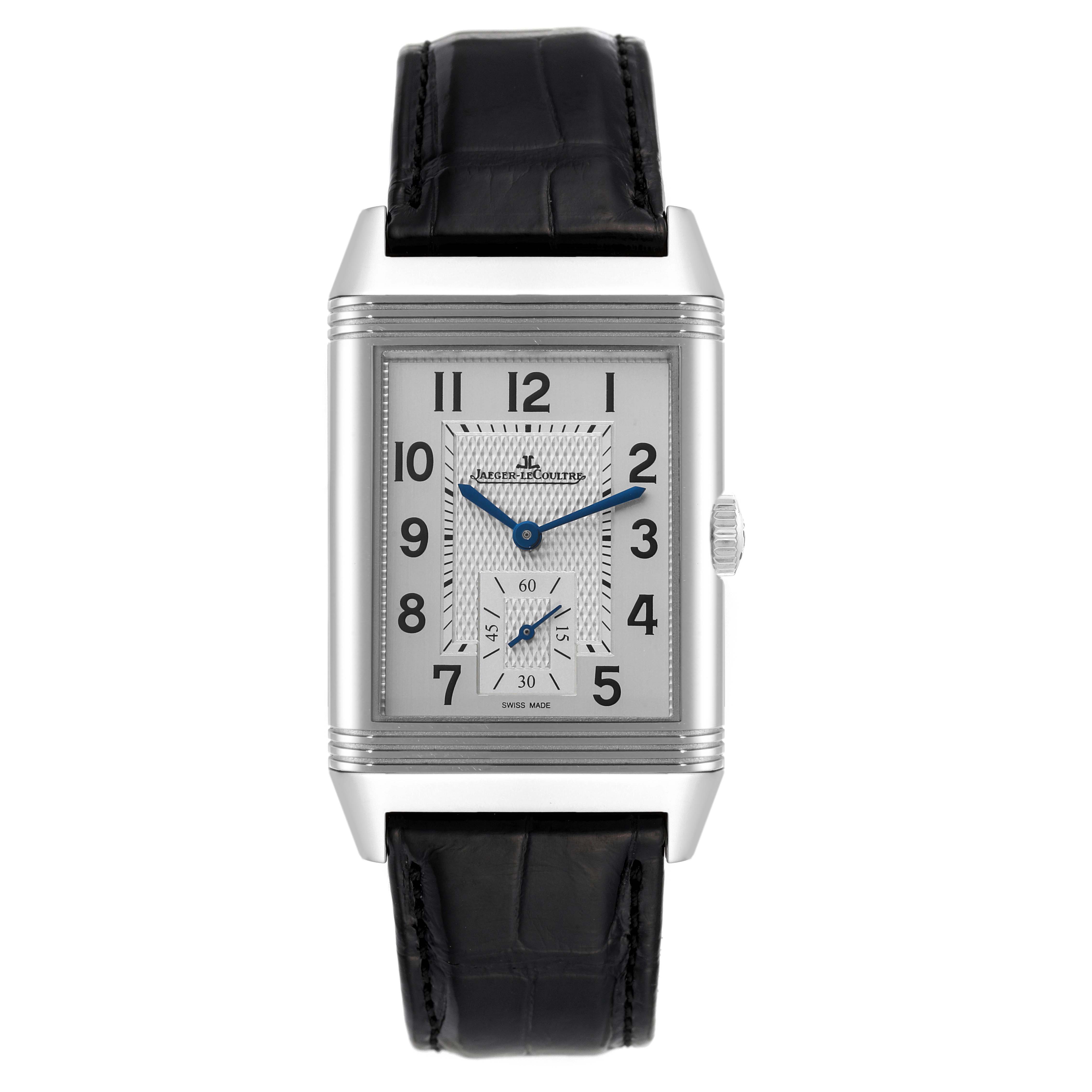 The image shows the front view of a Jaeger-LeCoultre Reverso watch with a silver rectangular dial and black leather strap.