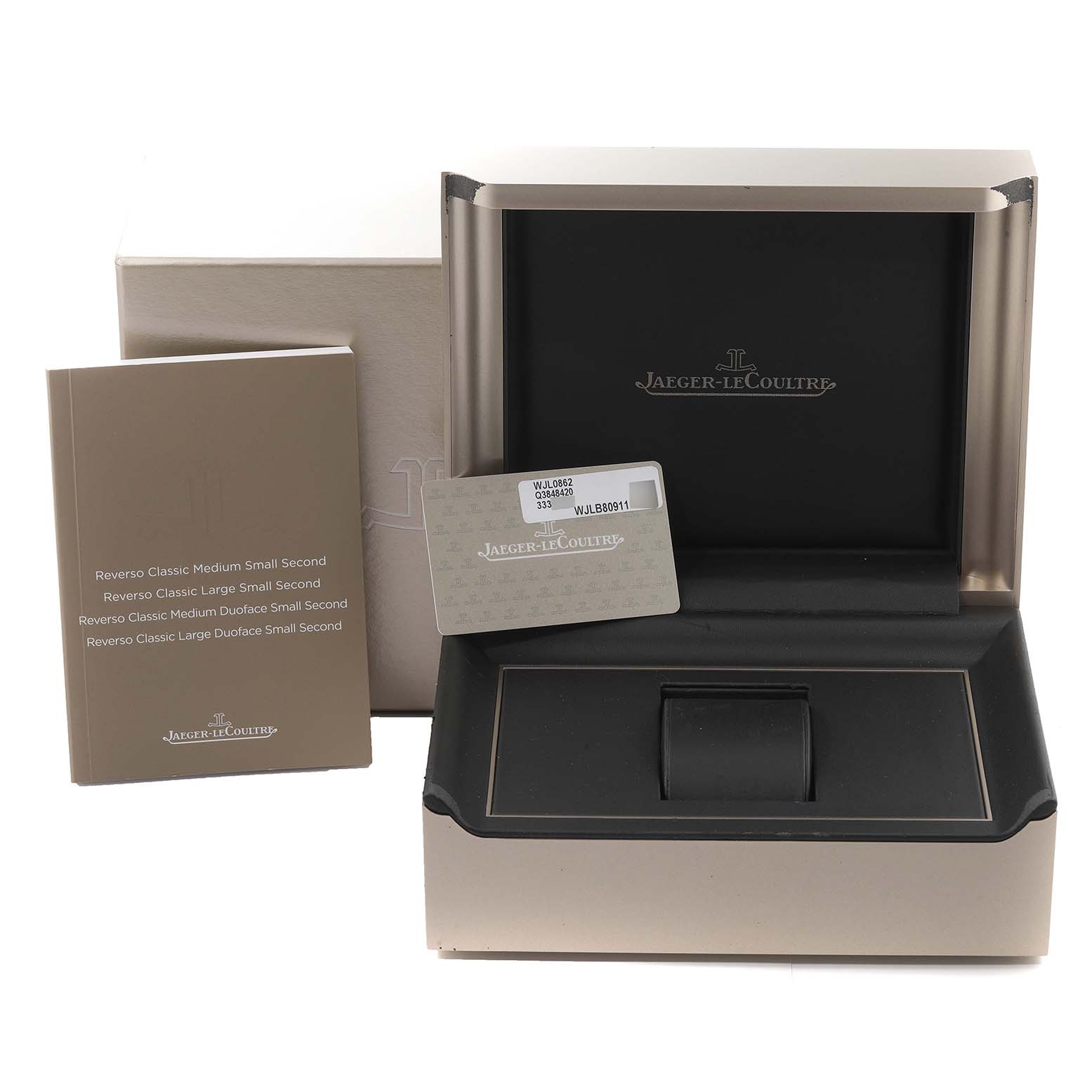 The image shows the packaging, user manual, and warranty card for a Jaeger LeCoultre Reverso Q3848420 Men's Stainless Steel Silver Dial Q3848420 Men's Stainless Steel Silver Dial model watch.