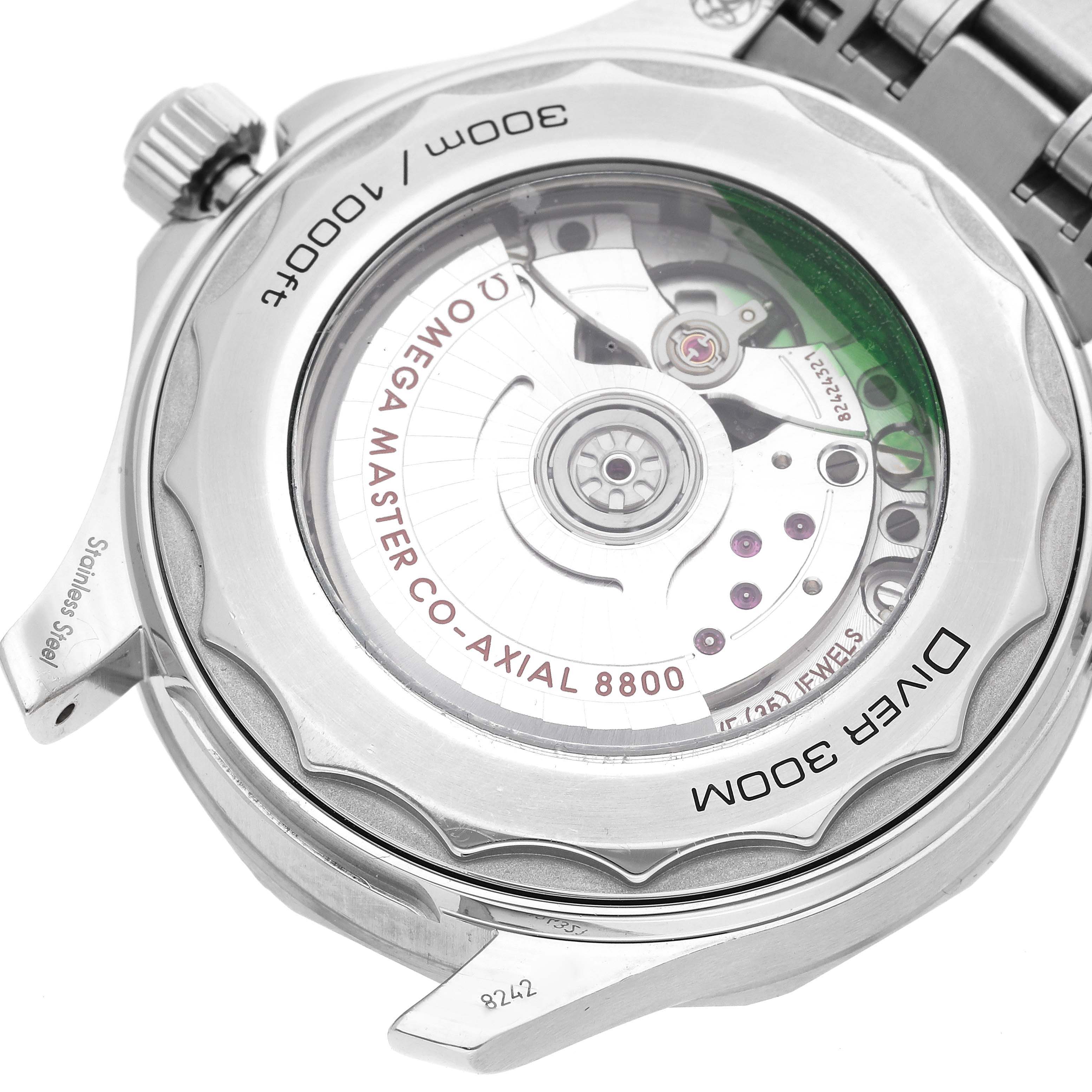 The image shows the case back and movement of an Omega Seamaster 210.30.42.20.04.001 Men
s Stainless Steel White Dial 210.30.42.20.04.001 Men
s Stainless Steel White Dial Diver 300M watch, highlighting the Omega Master Co-Axial 8800 movement.