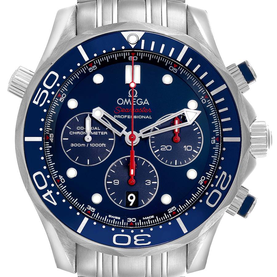 The Omega Seamaster watch is shown from the front, highlighting its blue dial, chronograph subdials, and stainless steel case.