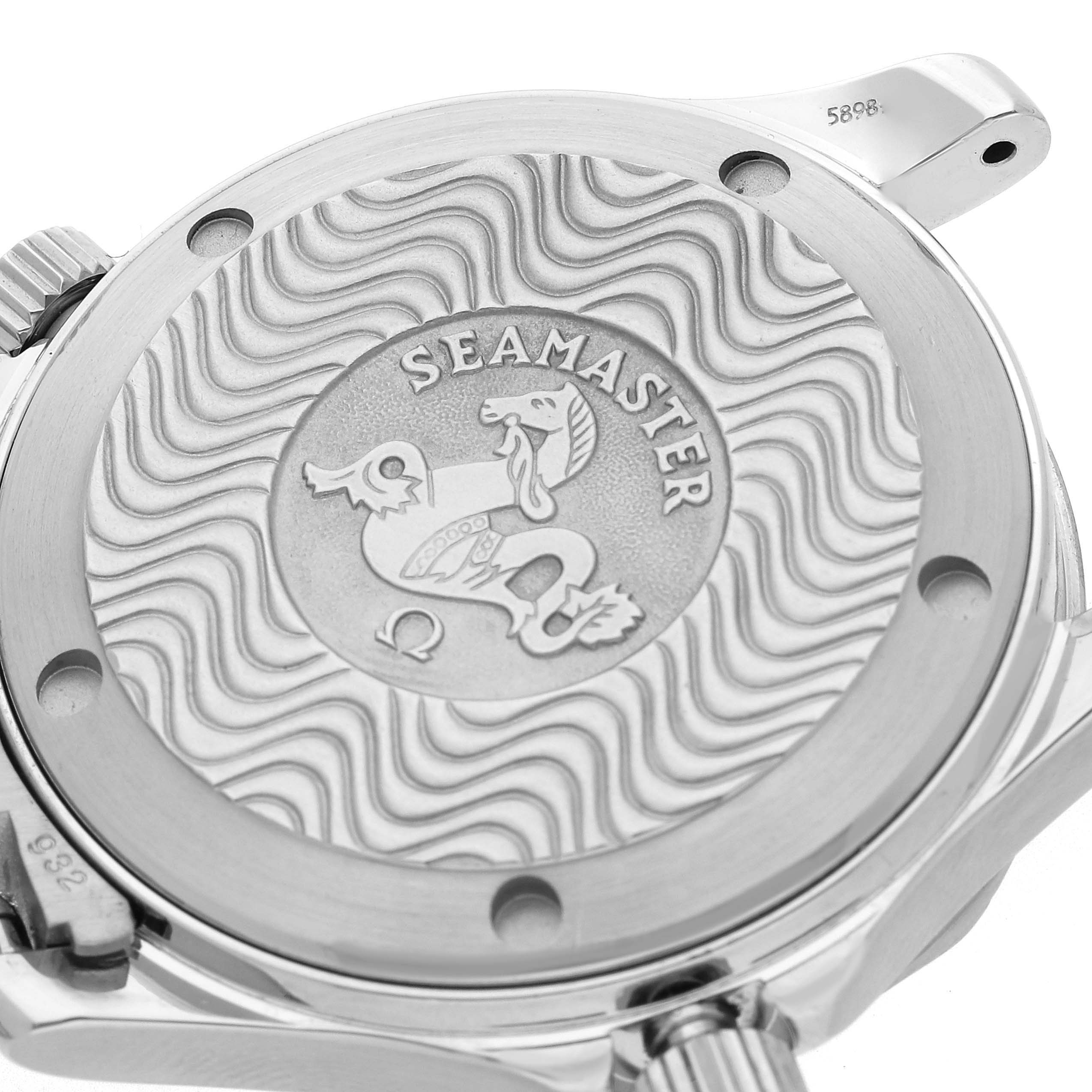 The image shows the Omega Seamaster 2263.80.00 Men
s Stainless Steel Blue Dial 2263.80.00 Men
s Stainless Steel Blue Dial watch
s case back, featuring engraved branding and wave patterns.