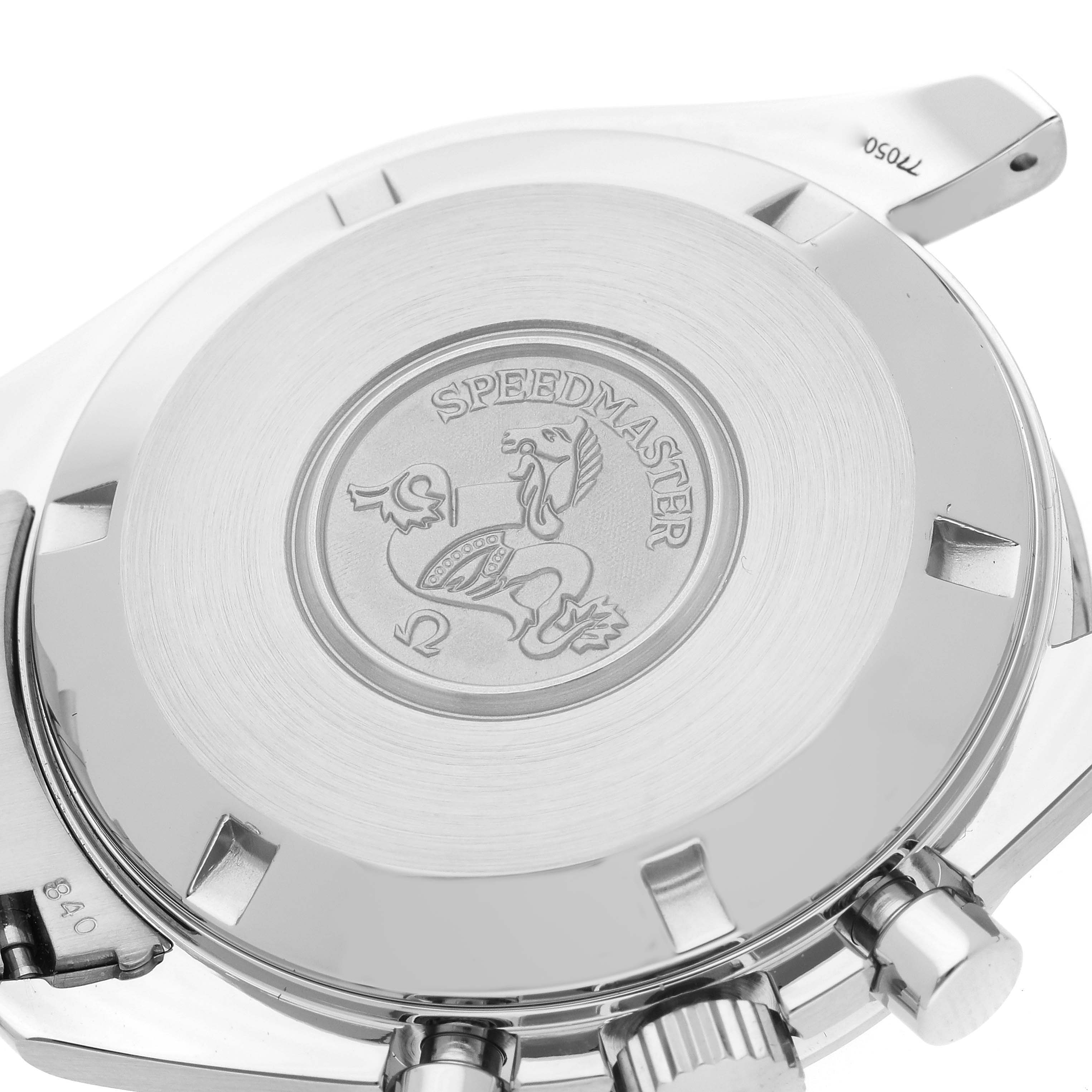 The image shows the back case and crown/pusher of an Omega Speedmaster 3594.50.00 Men
s Stainless Steel Black Dial 3594.50.00 Men
s Stainless Steel Black Dial watch from a close-up angle.