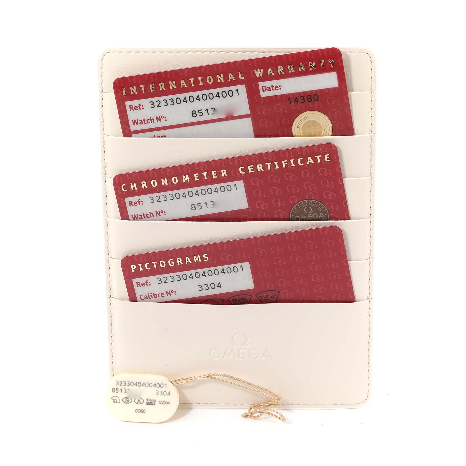 Image shows three Omega Speedmaster 323.30.40.40.04.001 Men's Stainless Steel White Dial 323.30.40.40.04.001 Men's Stainless Steel White Dial cards: International Warranty, Chronometer Certificate, Pictograms, in a white holder.