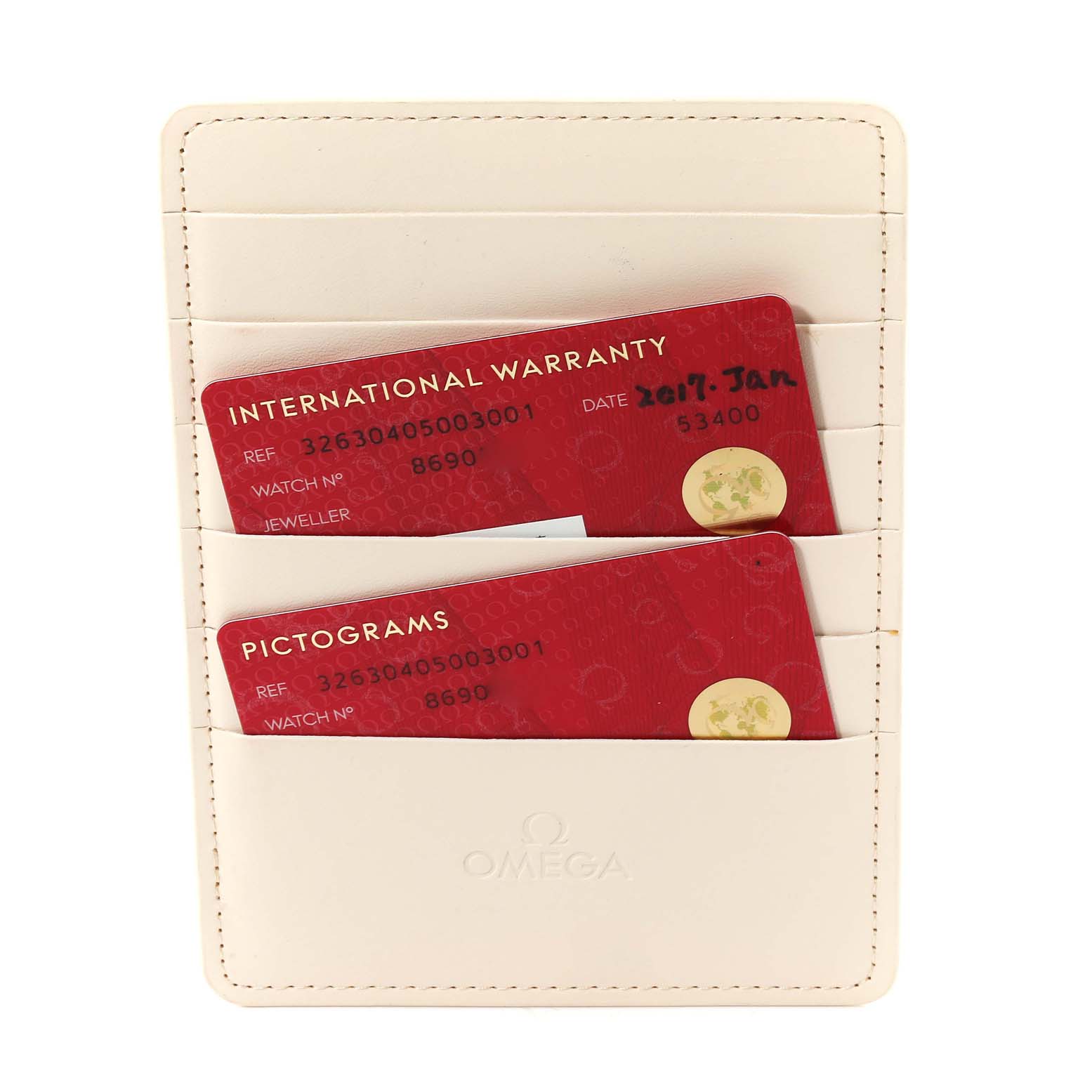 The image shows warranty and pictogram cards for an Omega Speedmaster 326.30.40.50.03.001 Men
s Stainless Steel Blue Dial 326.30.40.50.03.001 Men
s Stainless Steel Blue Dial, housed in a cream cardholder.