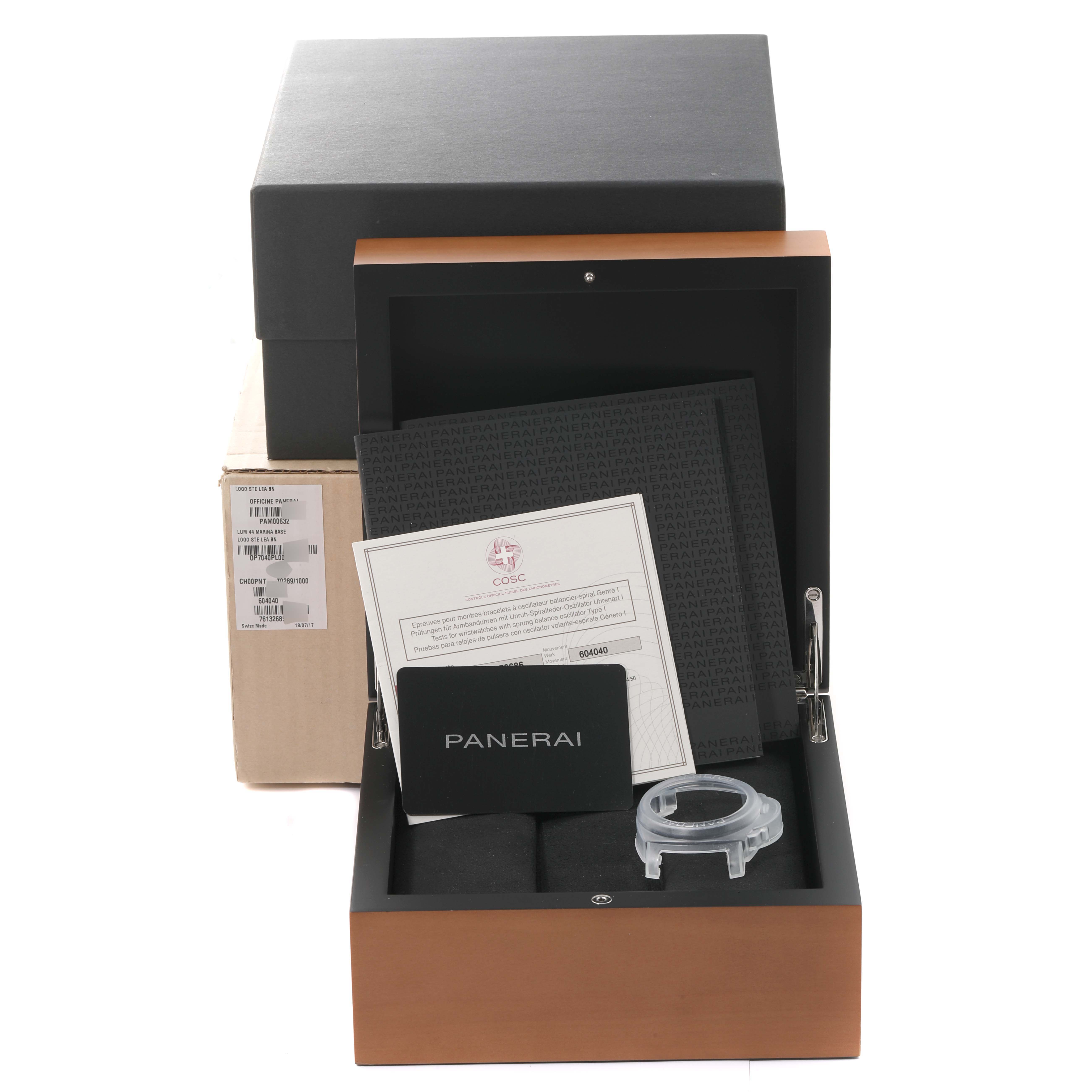 This image shows the packaging and accessories for the Panerai Luminor PAM00632 Men
s Stainless Steel Brown Dial PAM00632 Men
s Stainless Steel Brown Dial watch, including documentation and a watch case.
