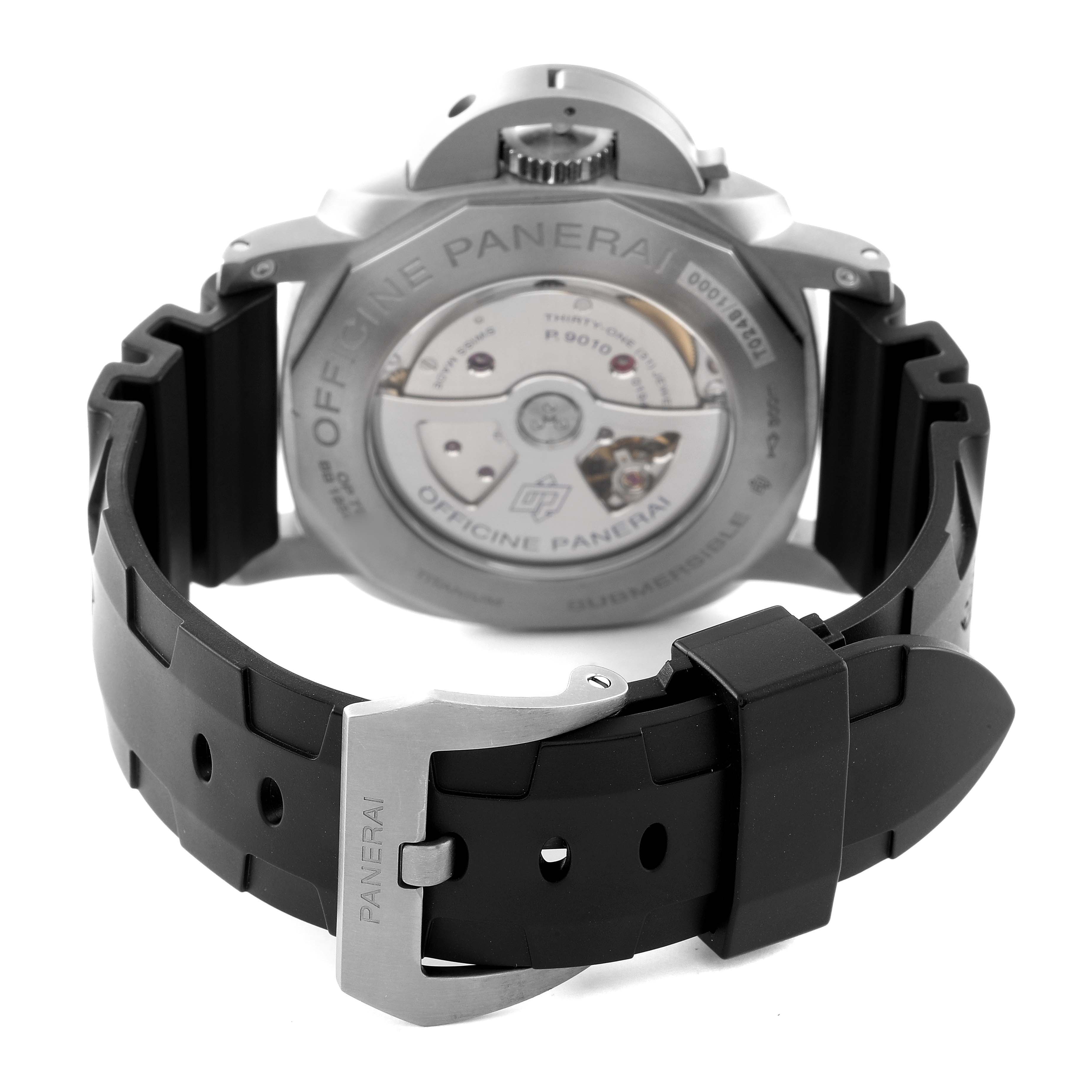 The image shows the back view of a Panerai Submersible PAM01305 Men's Titanium Black Dial PAM01305 Men's Titanium Black Dial watch, highlighting its open case back, rotor, and rubber strap with a buckle.
