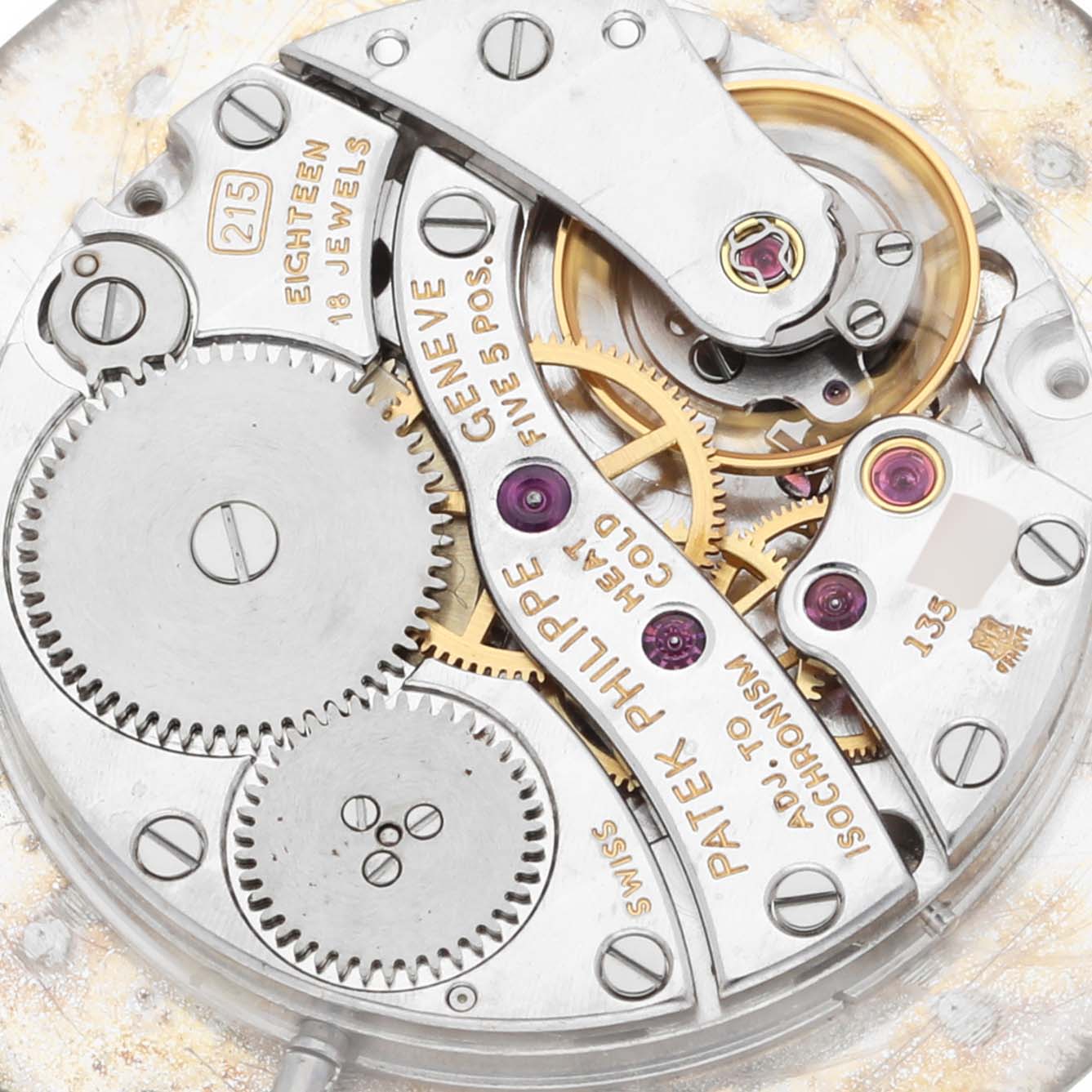 The image shows the intricate movement and internal components of a Patek Philippe Calatrava 3893G Men
s White Gold White Dial 3893G Men
s White Gold White Dial watch.