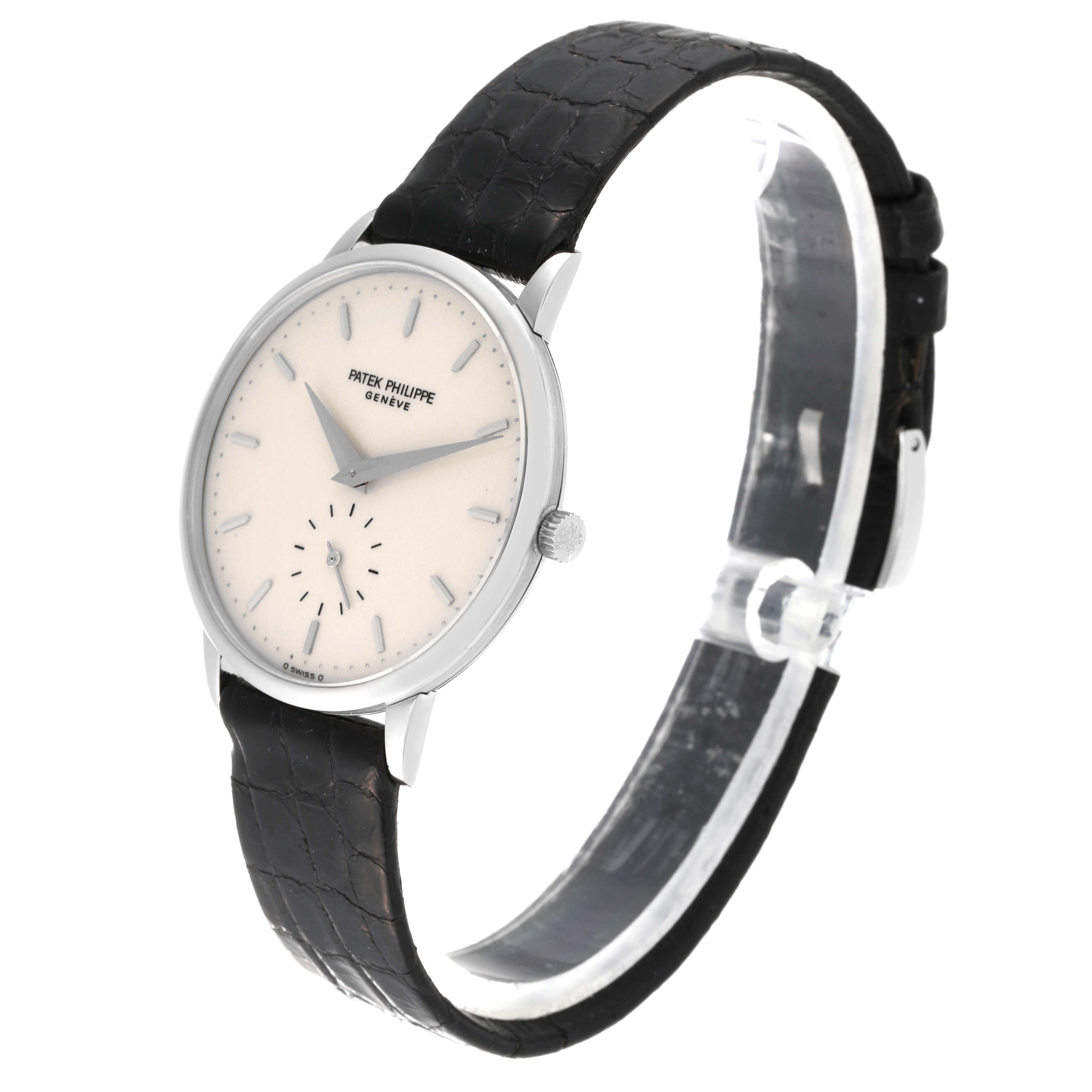 The image shows a Patek Philippe Calatrava 3893G Men
s White Gold White Dial 3893G Men
s White Gold White Dial watch at a slight angle, displaying the face, crown, and black leather strap.