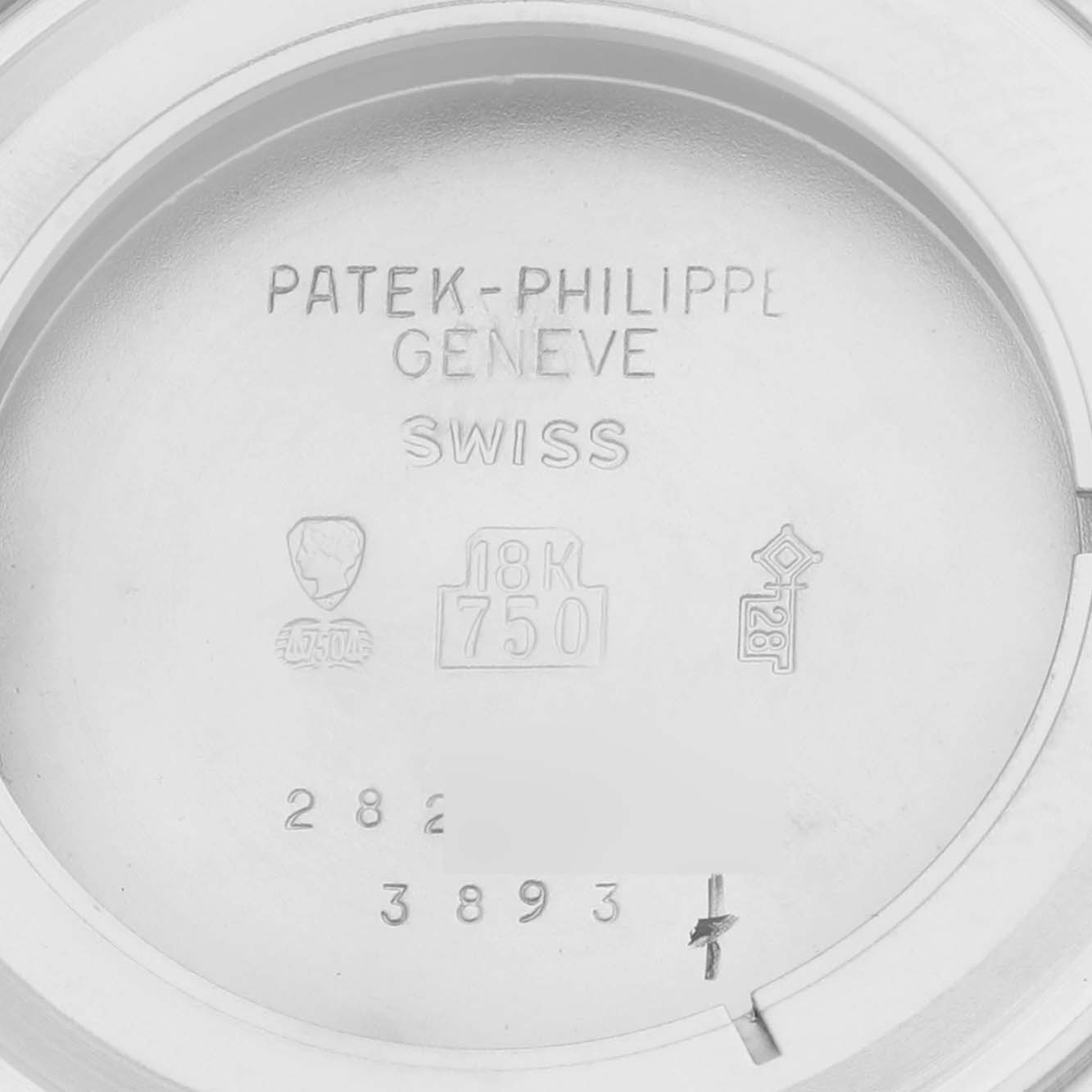 This image shows the inside caseback of a Patek Philippe Calatrava 3893G Men
s White Gold White Dial 3893G Men
s White Gold White Dial watch, displaying engravings and hallmarks.