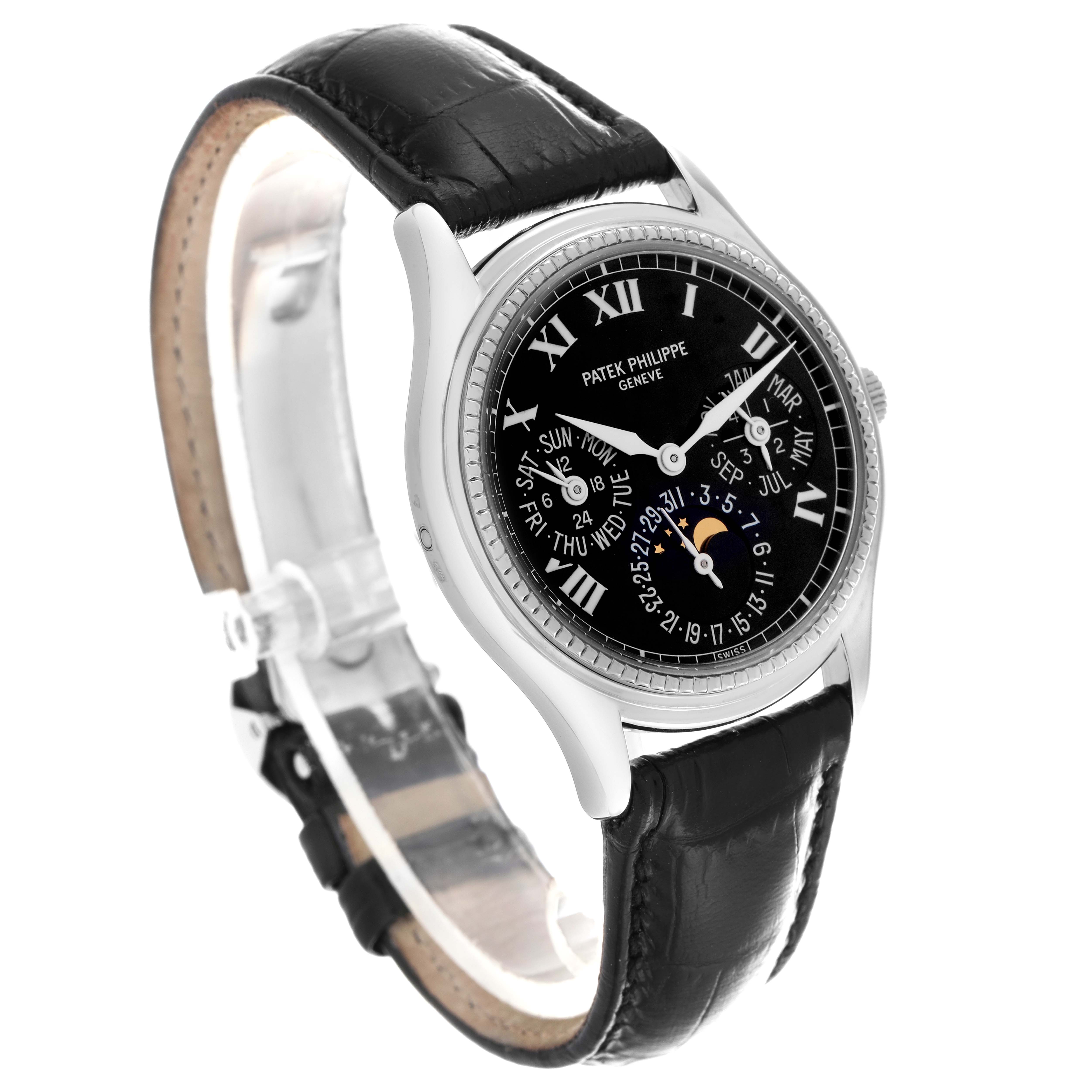 The Patek Philippe Complications 5038G Men
s White Gold Black Dial 5038G Men
s White Gold Black Dial watch is shown from a three-quarter angle, highlighting the dial, case, and leather strap.