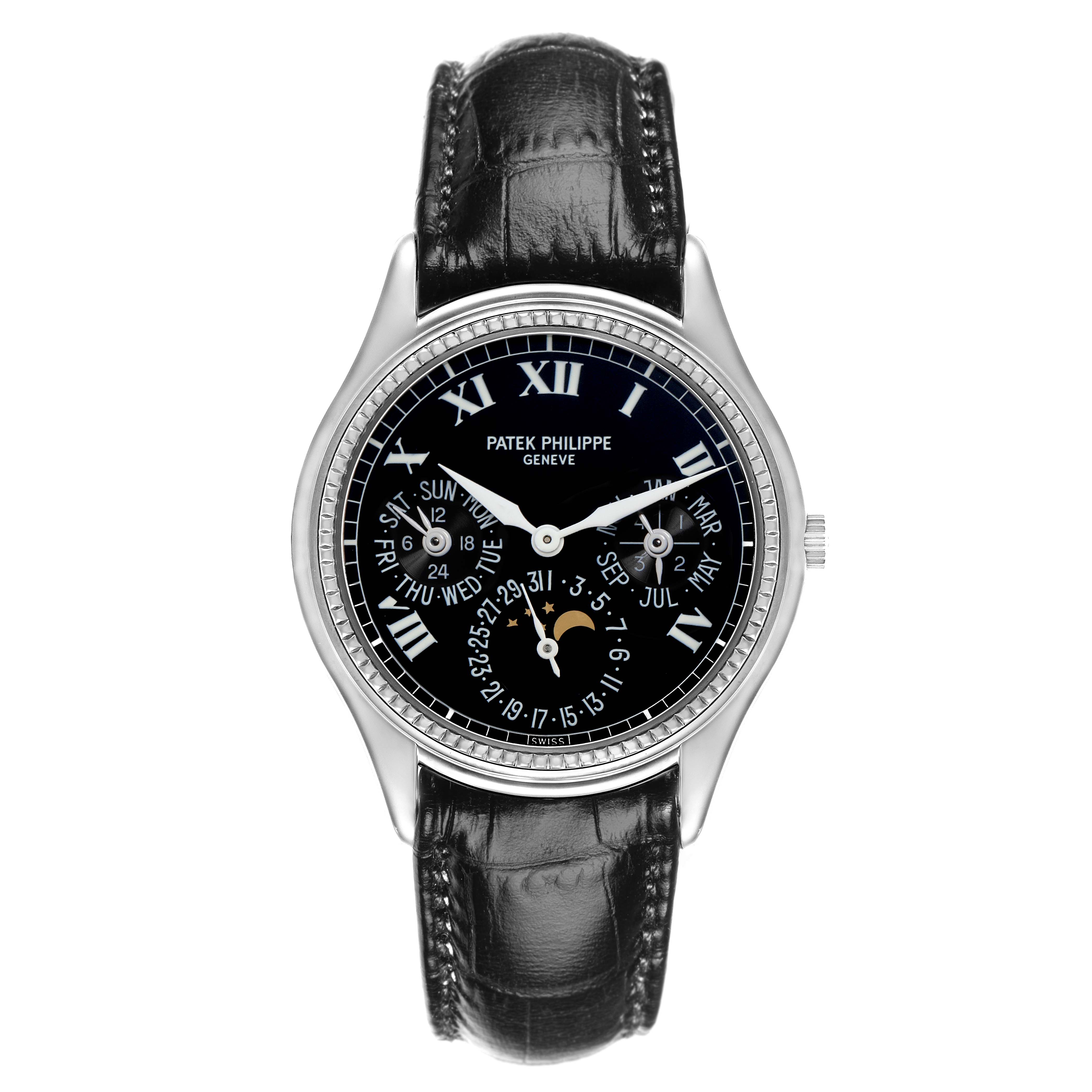 The Patek Philippe Complications 5038G Men
s White Gold Black Dial 5038G Men
s White Gold Black Dial watch is shown from a front angle, featuring a black dial with Roman numerals and a leather strap.