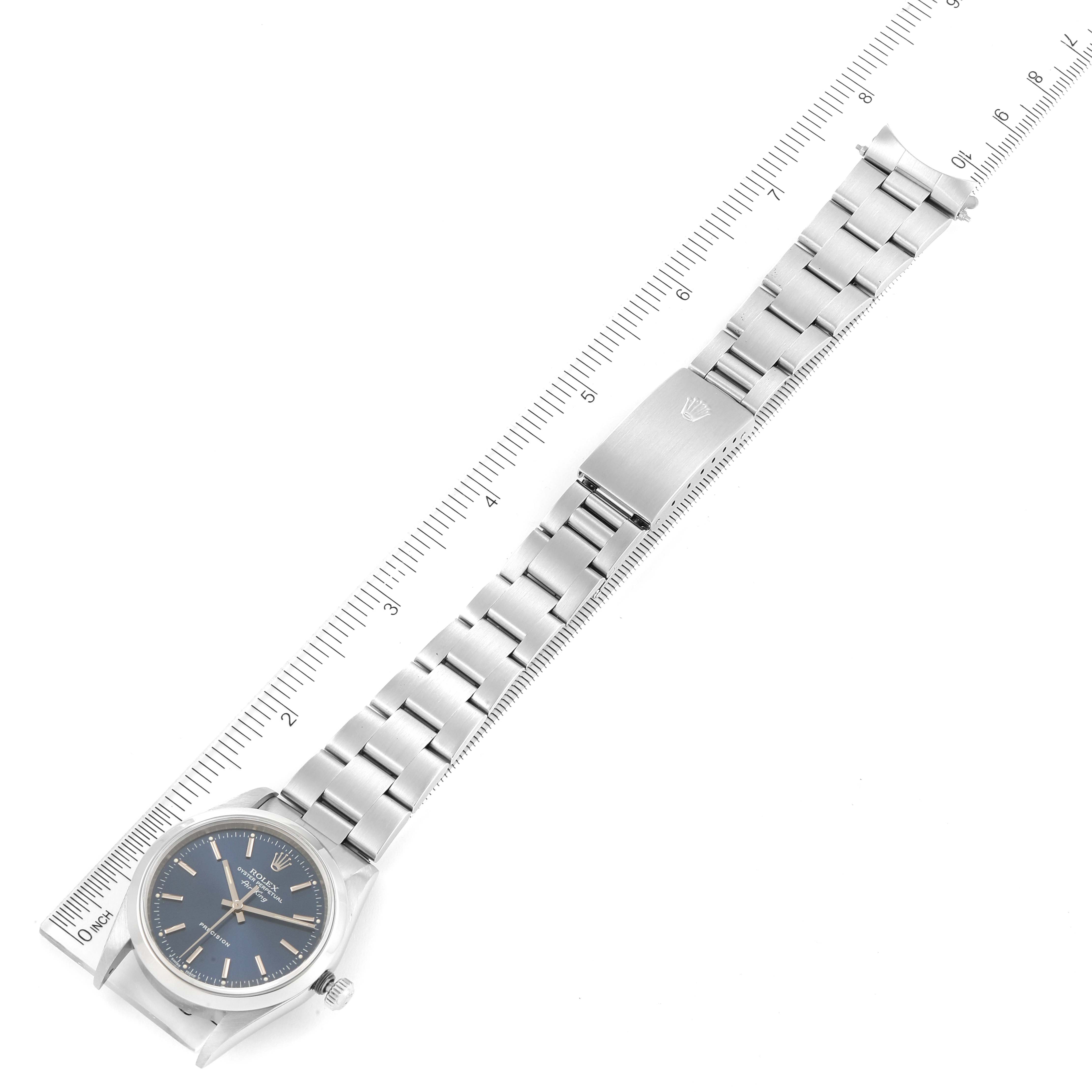 The image shows a Rolex Air-King 14000 Men's Stainless Steel Blue Dial 14000 Men's Stainless Steel Blue Dial watch laid flat, displaying its bracelet, clasp, and face with a ruler for scale.