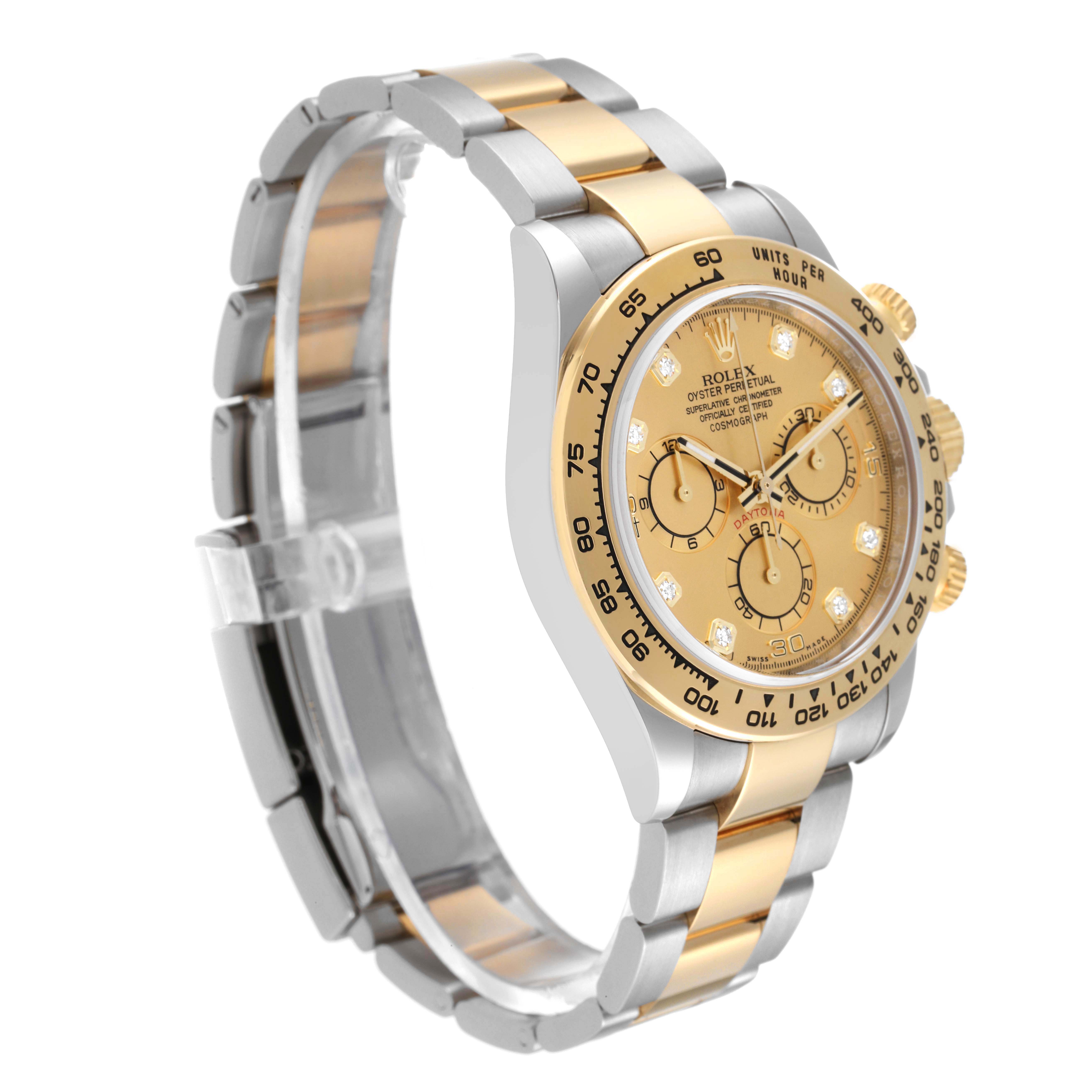 This image shows a side angle of the Rolex Daytona 116503 Men's Steel and Gold (two tone) Champagne Dial 116503 Men's Steel and Gold (two tone) Champagne Dial watch, highlighting the gold bezel, dial, and two-tone bracelet.