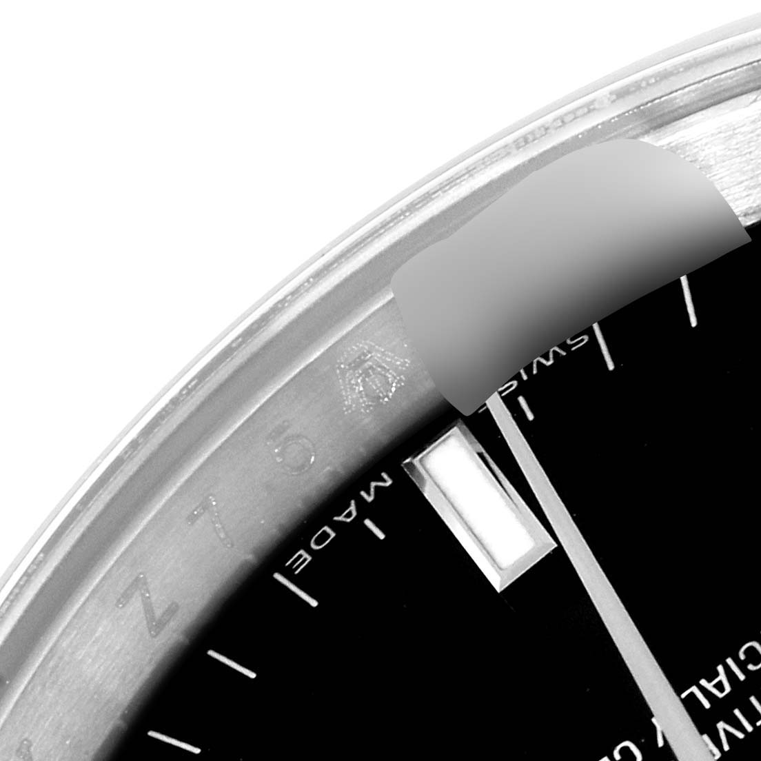 This image shows a close-up of the dial and part of the bezel of a Rolex Date 115200 Men's Stainless Steel Black Dial 115200 Men's Stainless Steel Black Dial model watch.