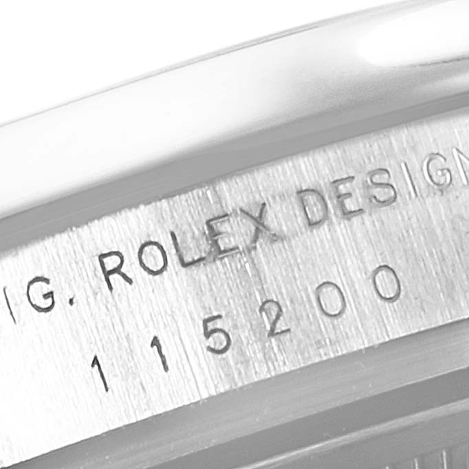 This close-up image shows part of the casing with the engravings for the Date model by Rolex.