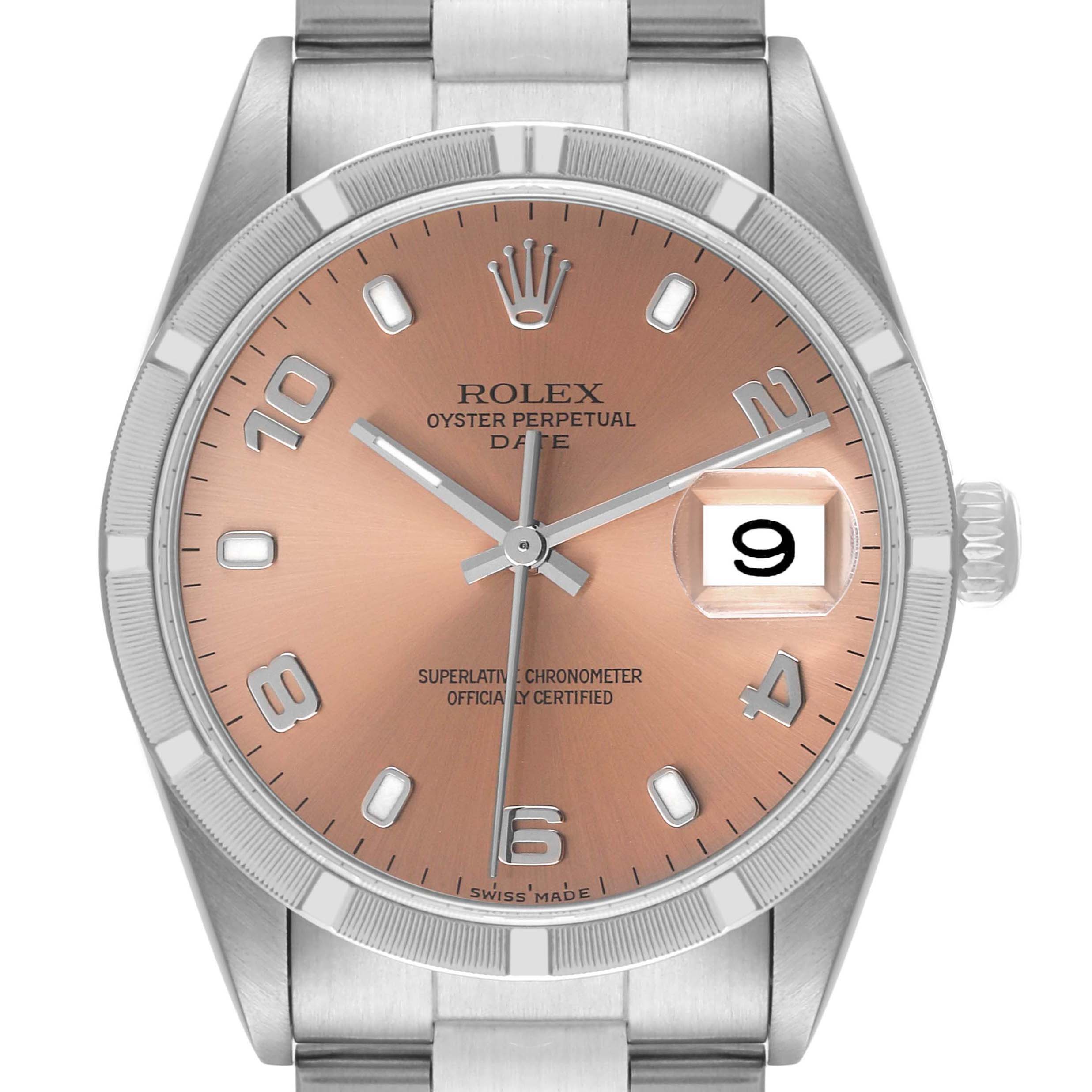 The image shows a straight-on view of the Rolex Date 15210 Men's Stainless Steel Pink Dial 15210 Men's Stainless Steel Pink Dial model, highlighting the dial, hands, date window, and a portion of the bracelet.