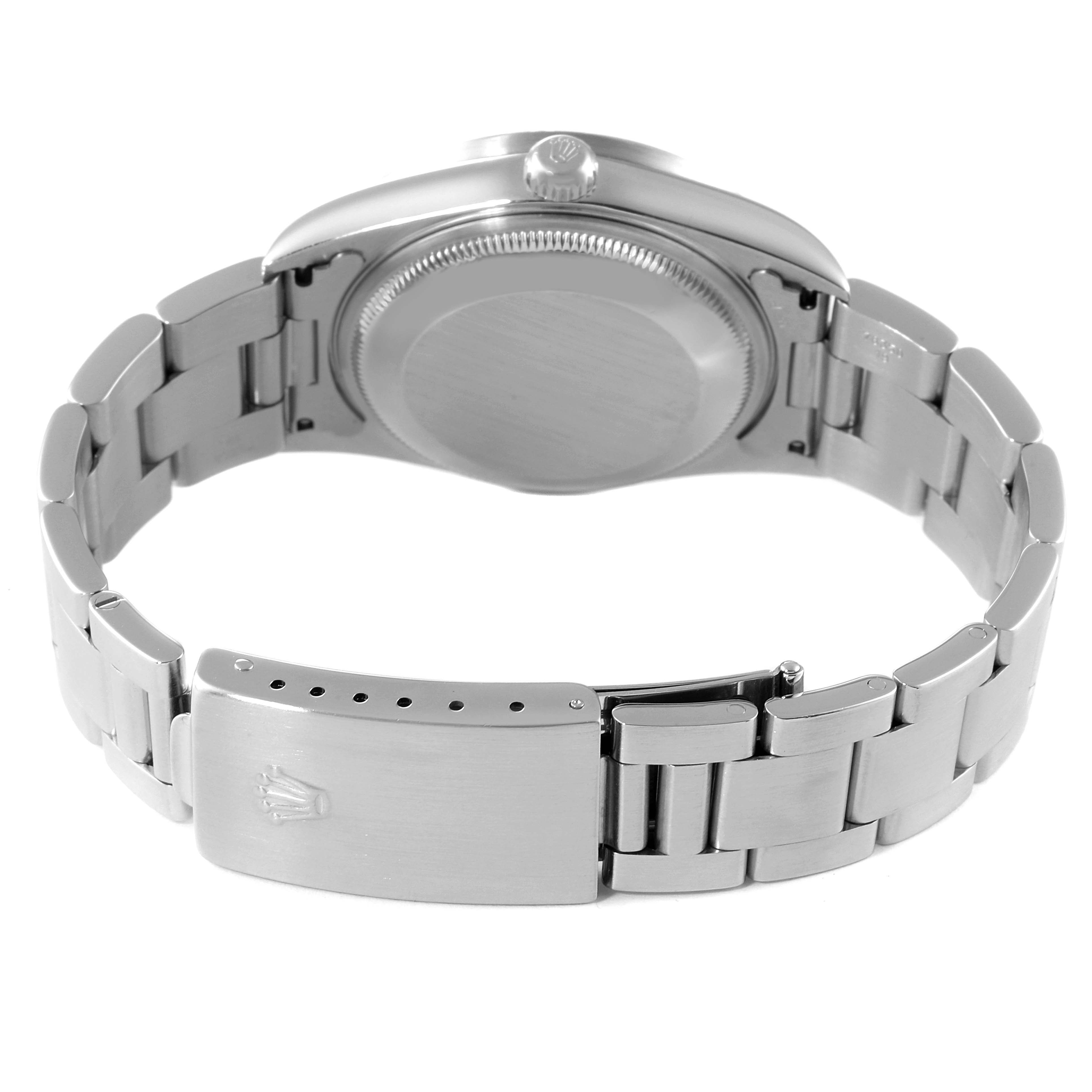 This image shows the back case, crown, and clasp of the Rolex Date 15210 Men's Stainless Steel Pink Dial 15210 Men's Stainless Steel Pink Dial model watch, viewed from the reverse side.