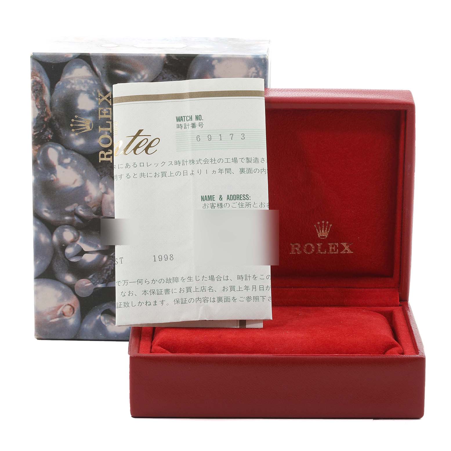 The image shows a red Rolex Datejust 69173 Women's Steel and Gold (two tone) Black Dial 69173 Women's Steel and Gold (two tone) Black Dial watch box, a booklet, and a certificate of authenticity in front.