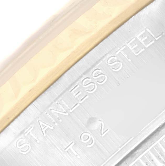 This close-up image shows the stainless steel bezel portion of a Rolex Datejust 69173 Women's Steel and Gold (two tone) Black Dial 69173 Women's Steel and Gold (two tone) Black Dial watch.